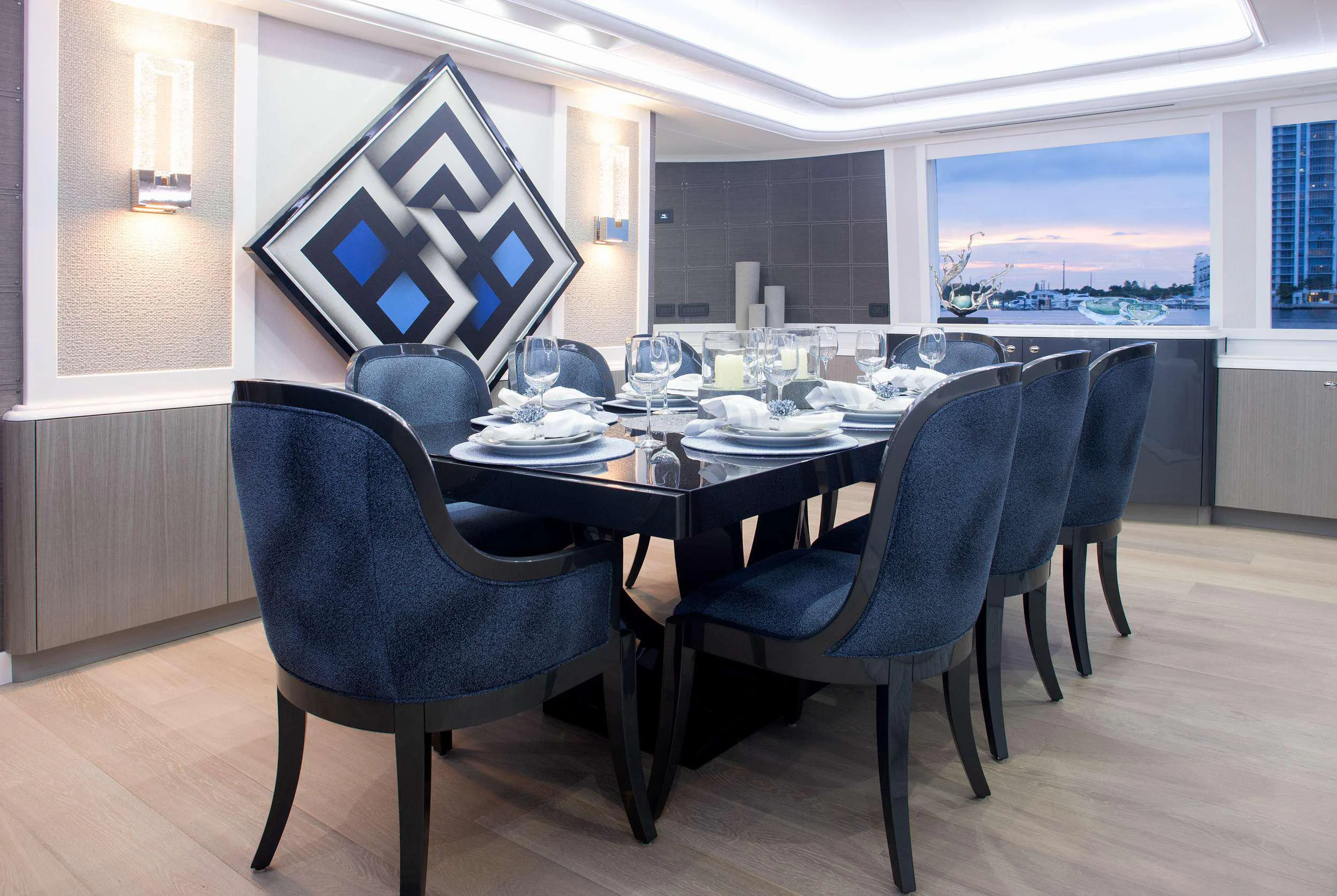 a conference room with a table and chairs aboard HANNAH Yacht for Charter