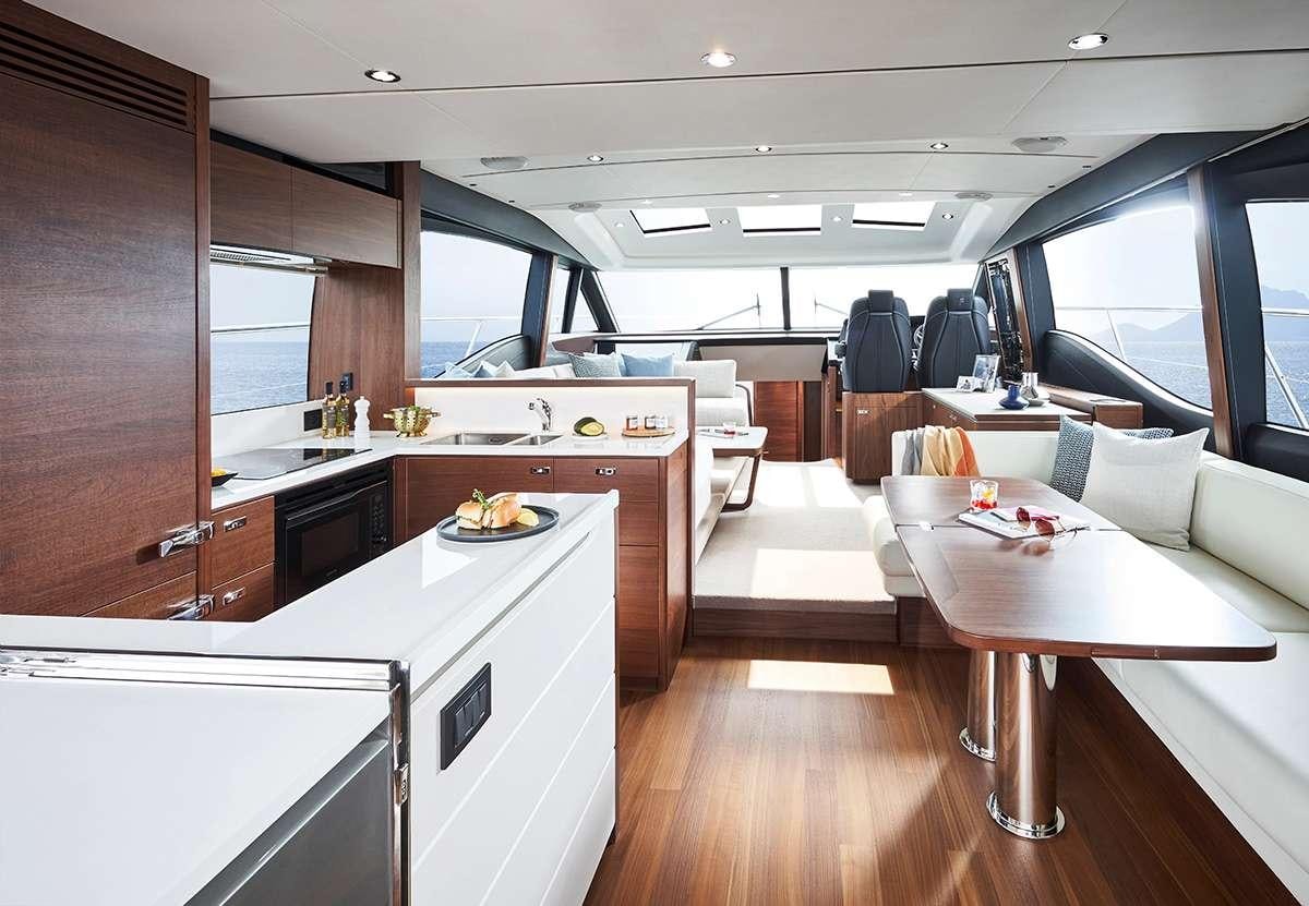 a kitchen with a large window aboard CHAMELEON III Yacht for Charter