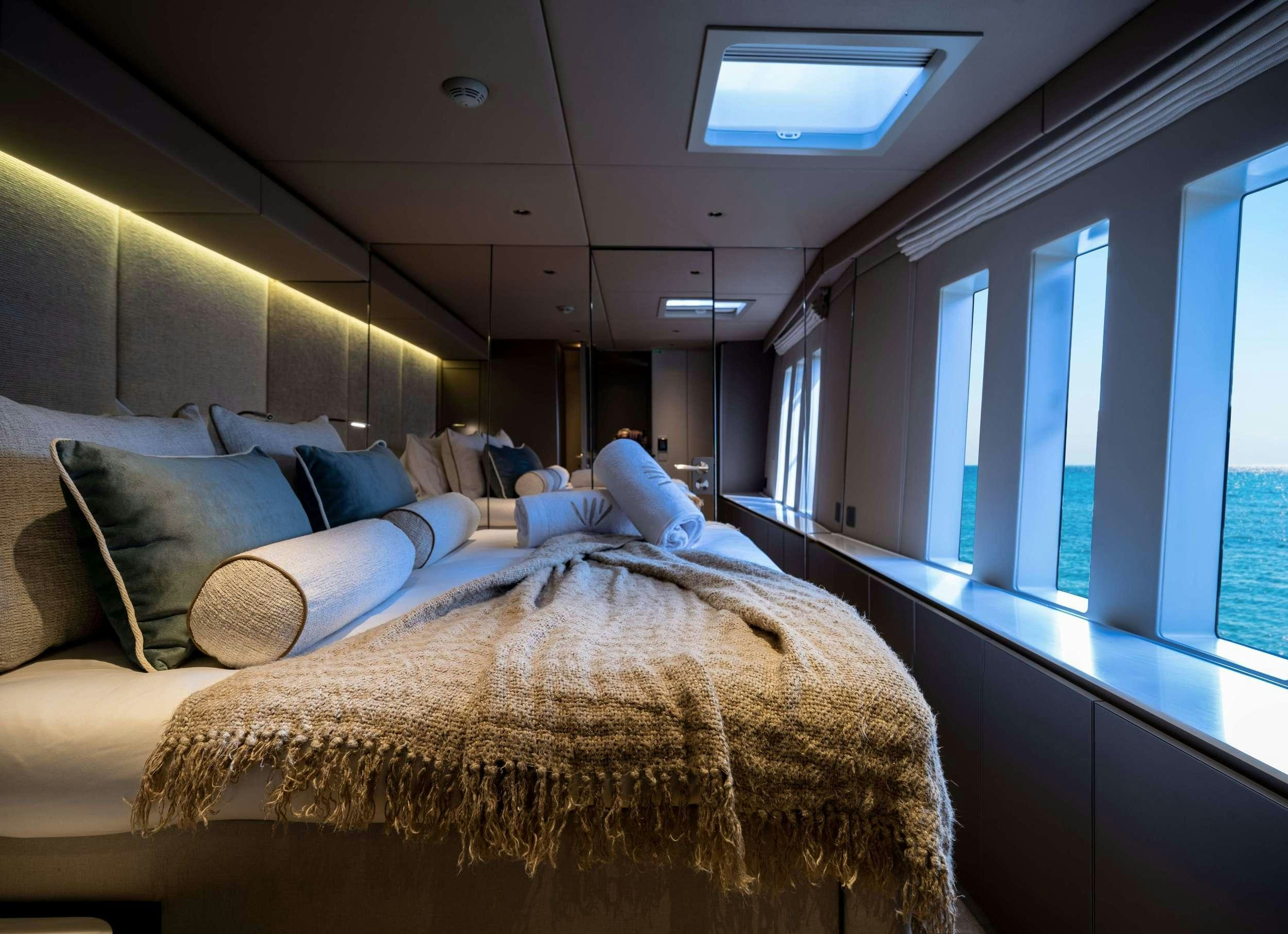 a bed in a room aboard VIVA LA VIDA Yacht for Charter
