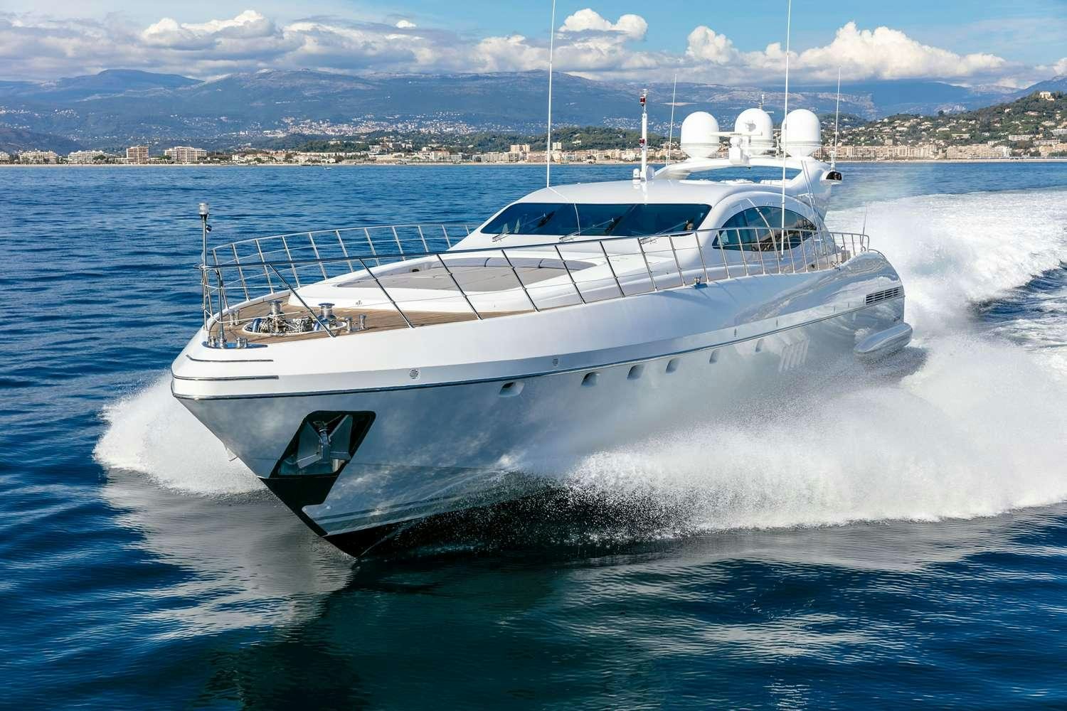a white yacht on the water aboard BO Yacht for Charter