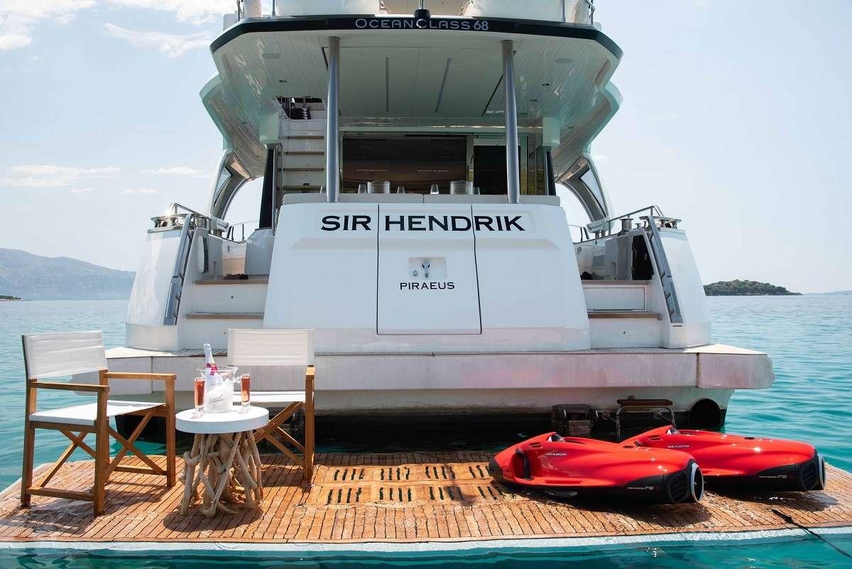 a boat on a dock aboard SIR HENDRIK Yacht for Charter