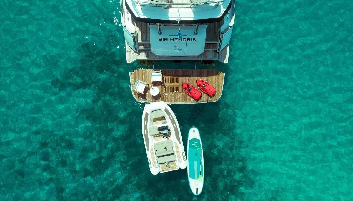 a couple of metal objects on a green surface aboard SIR HENDRIK Yacht for Charter