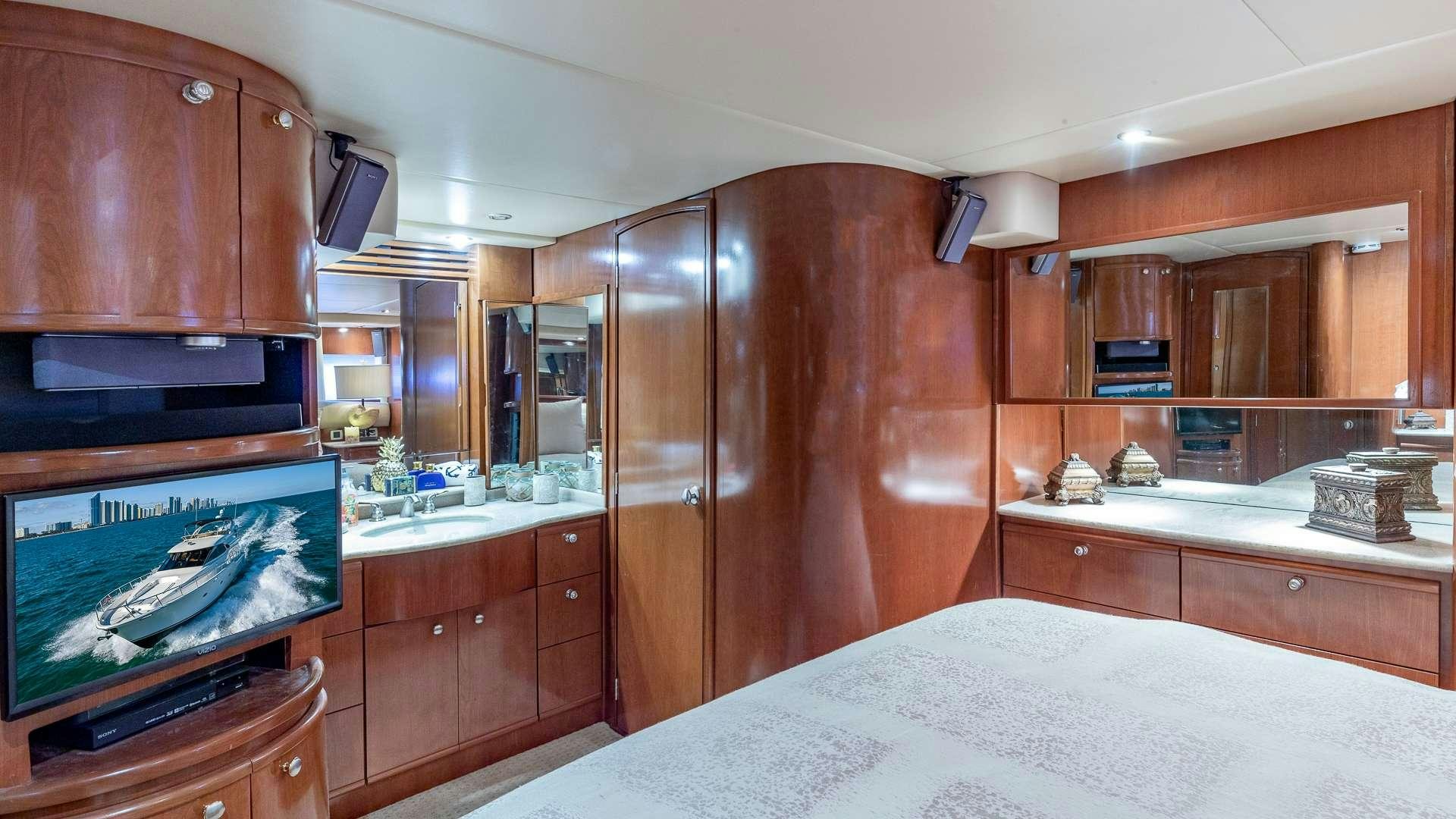 a kitchen with wooden cabinets aboard ELEGANT LADY Yacht for Charter