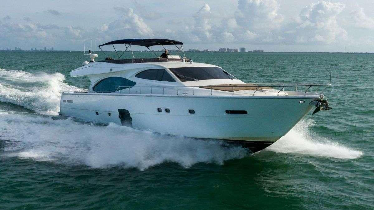 a white yacht in the water aboard DESTINY Yacht for Charter