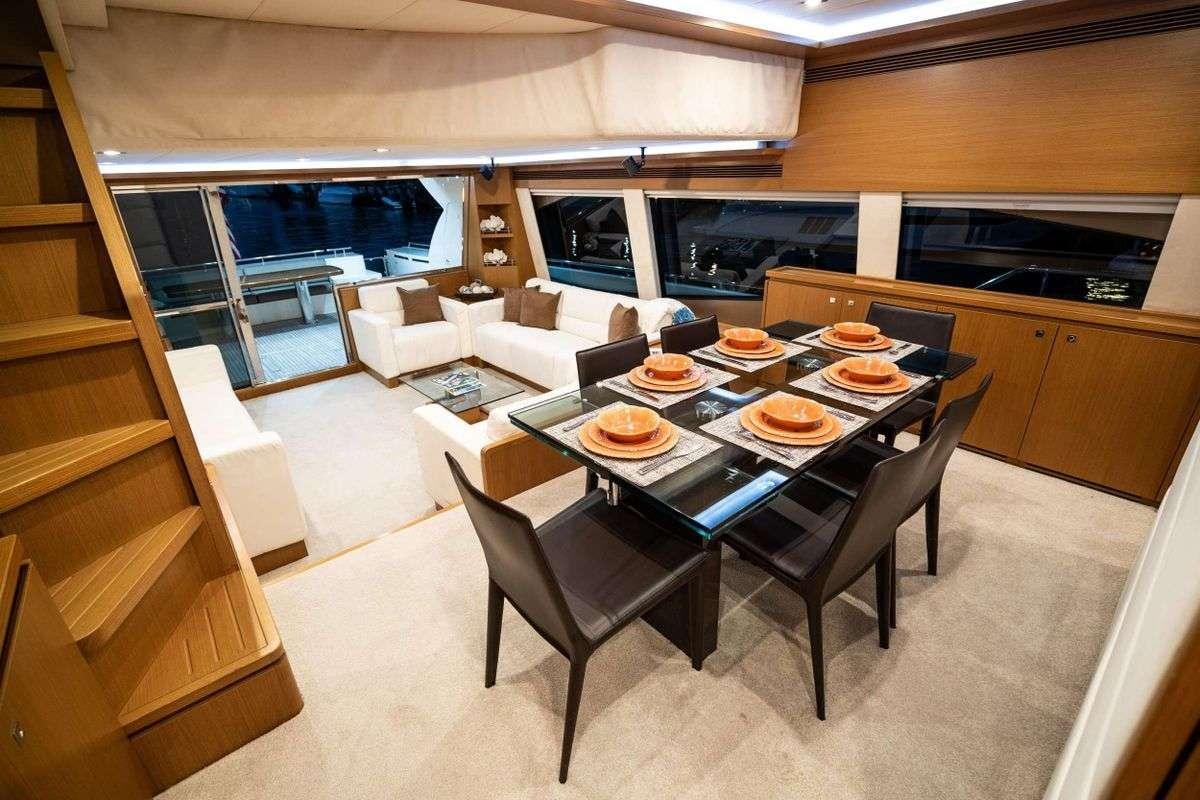 a kitchen and dining area aboard DESTINY Yacht for Charter