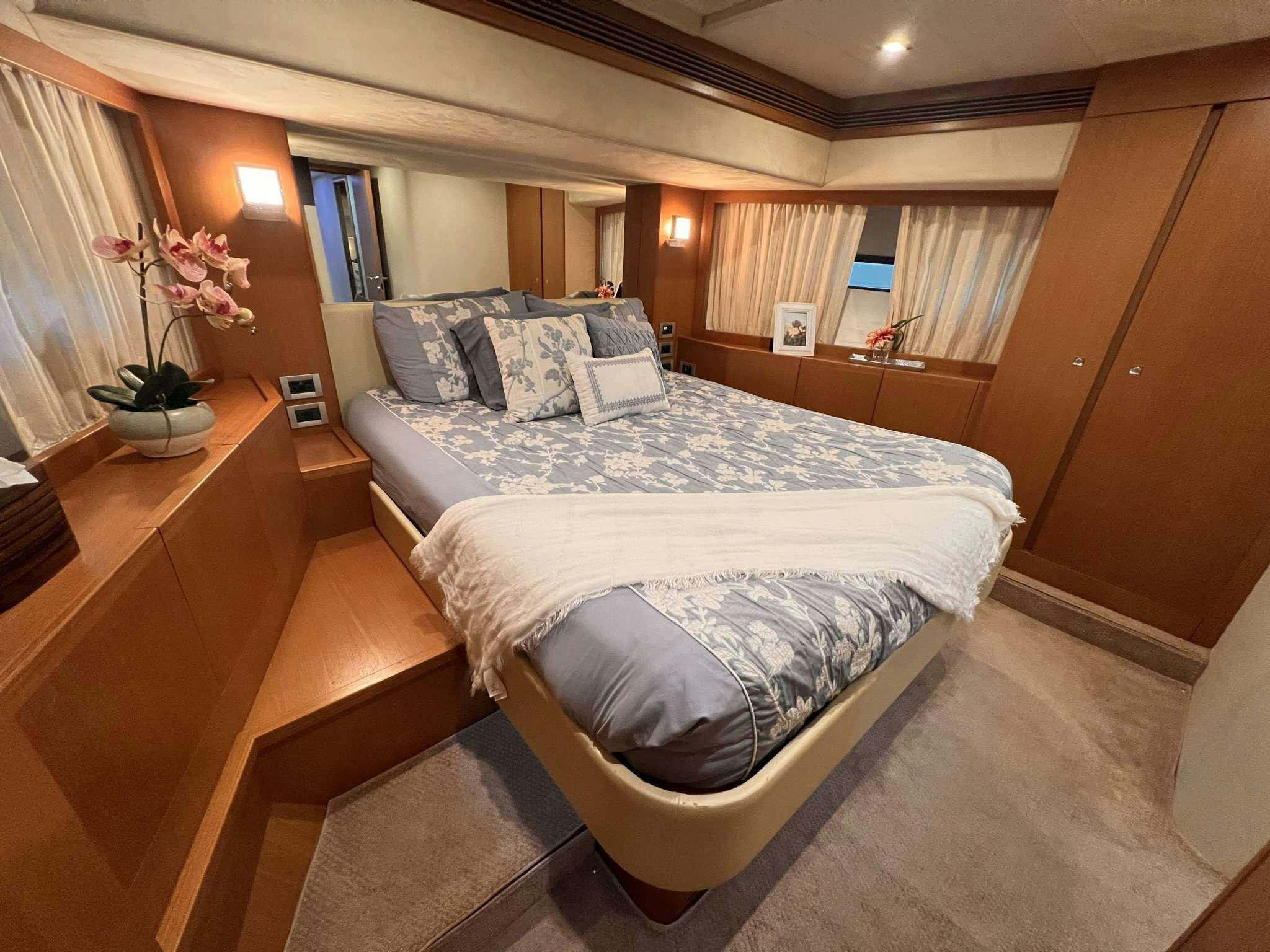 a bed in a room aboard DESTINY Yacht for Charter