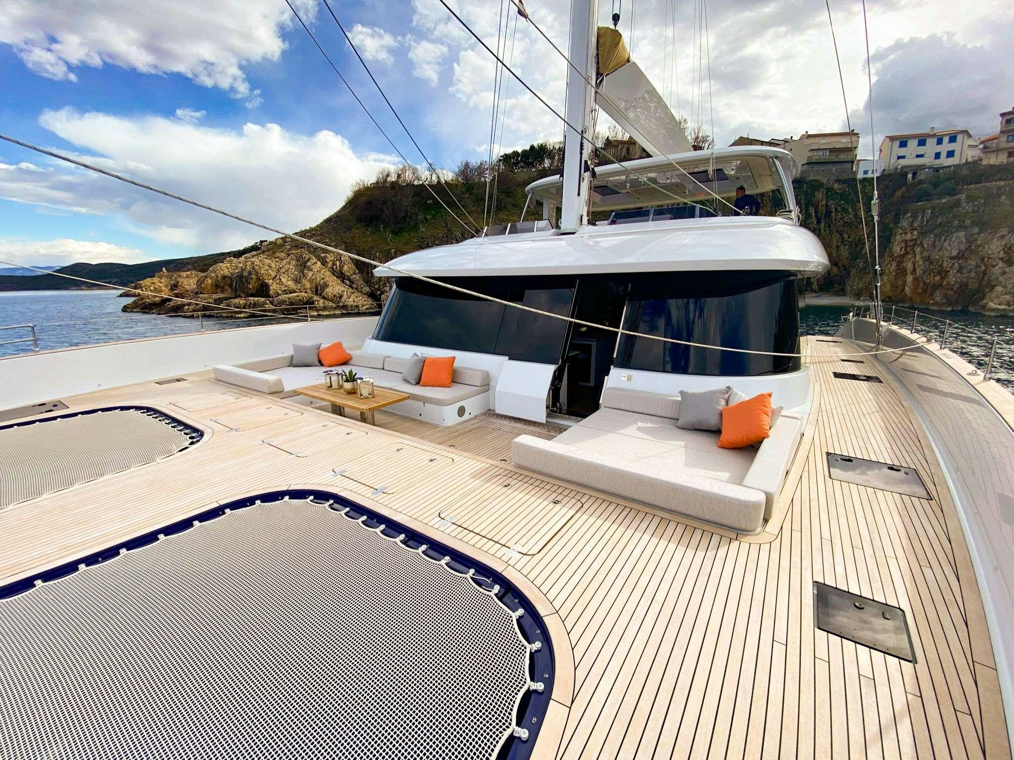 a boat on a deck aboard SUNREEF 80 FANTASTIC TOO Yacht for Charter