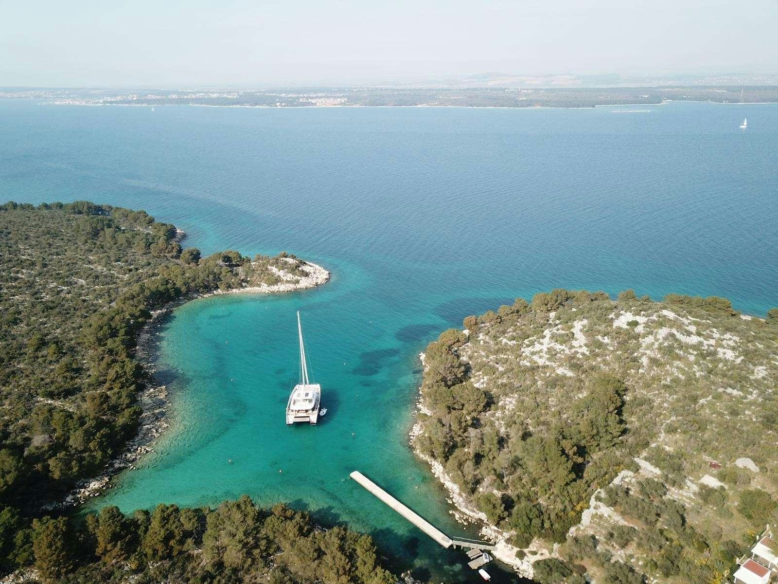 a boat sailing on the sea aboard SUNREEF 80 FANTASTIC TOO Yacht for Charter