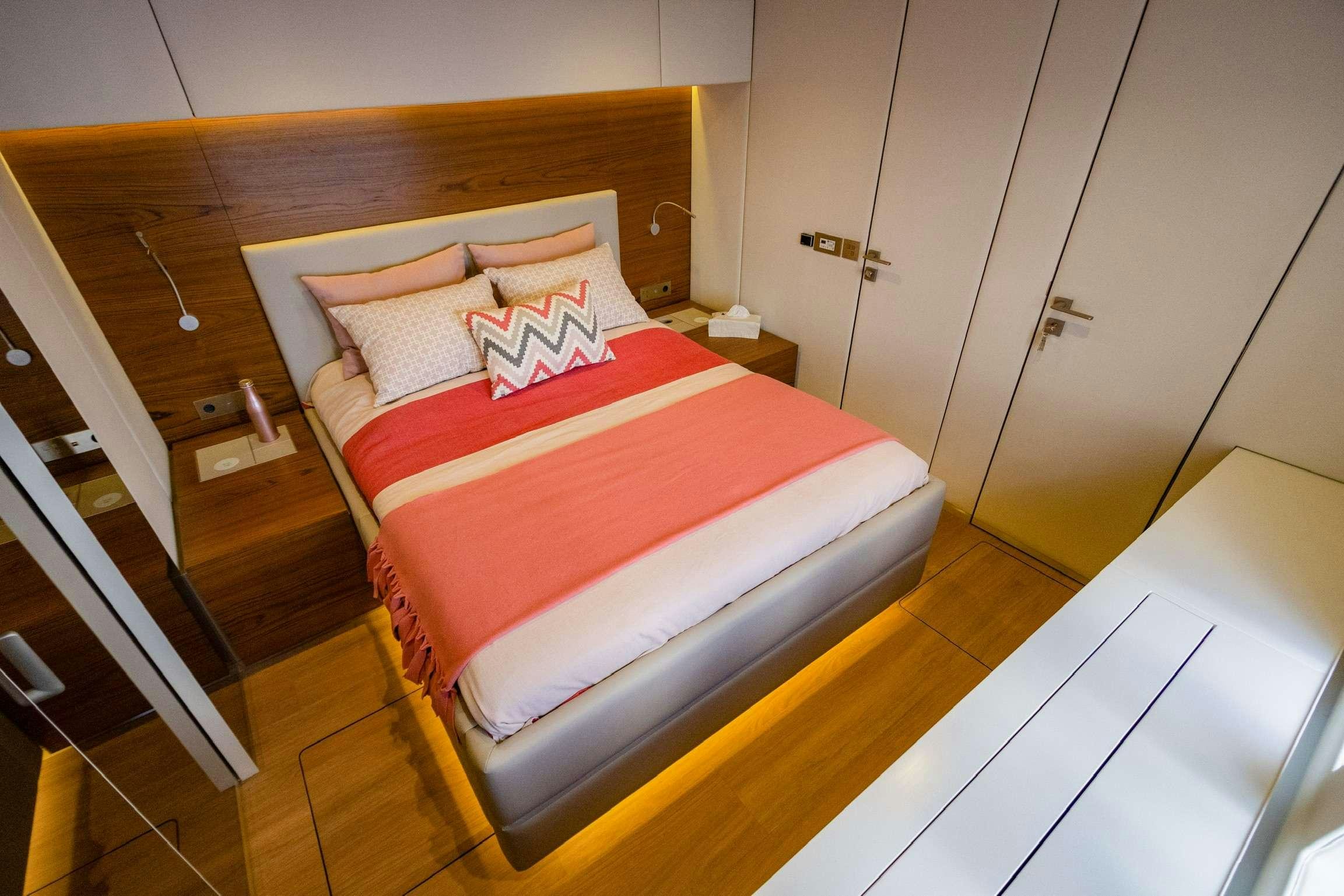 a bed in a room aboard SUNREEF 80 FANTASTIC TOO Yacht for Charter