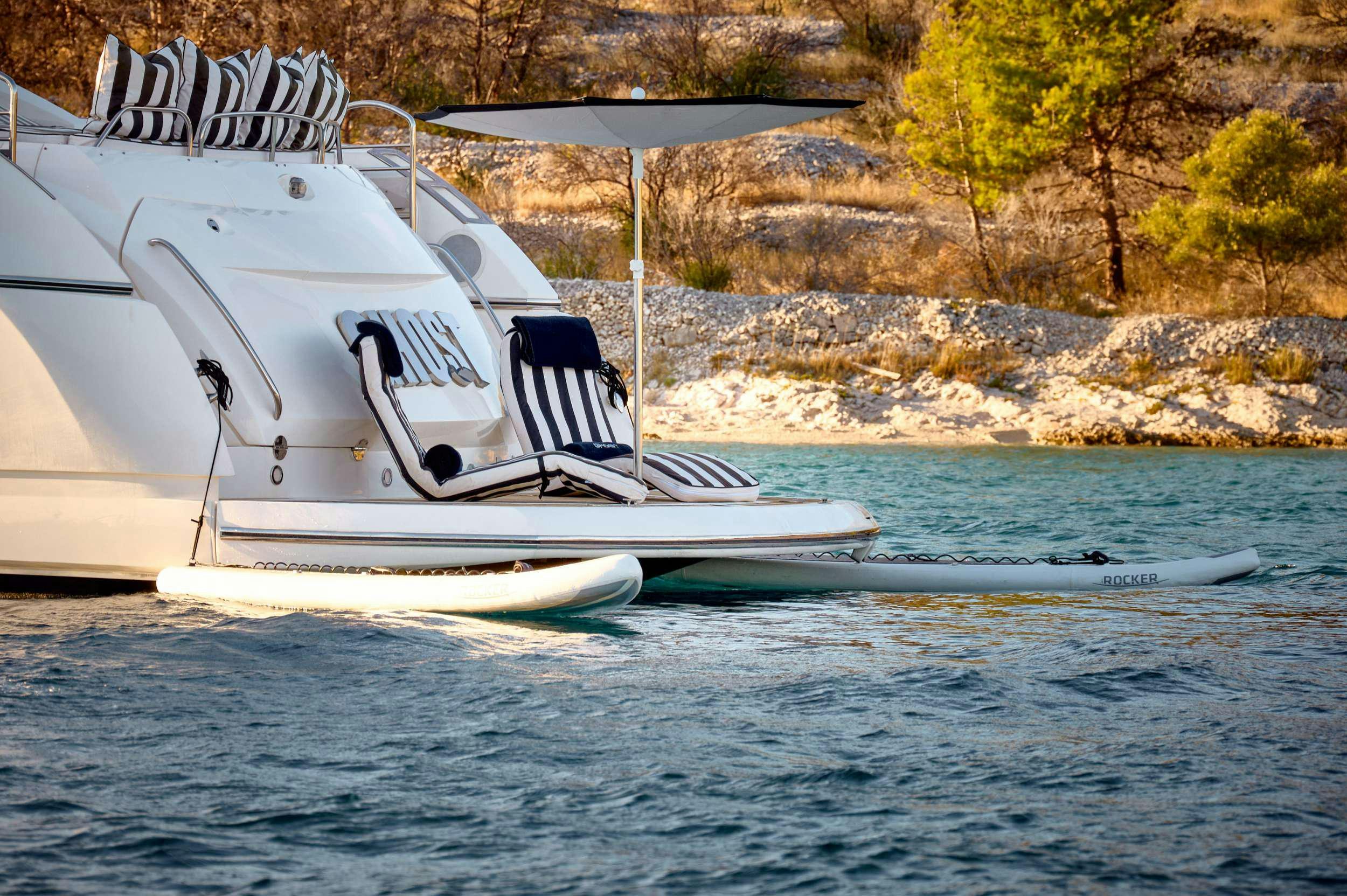 a boat on the water aboard SUNSEEKER PREDATOR 72 GHOST Yacht for Charter