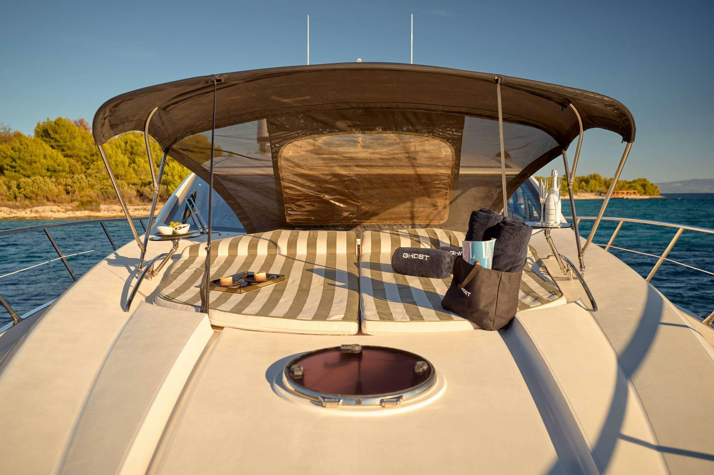 a boat on the water aboard SUNSEEKER PREDATOR 72 GHOST Yacht for Charter