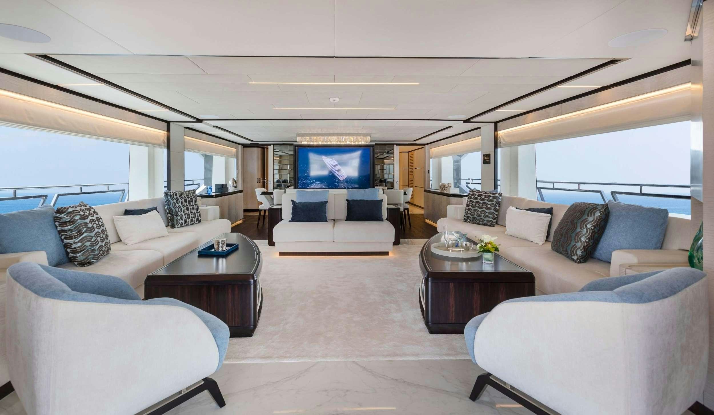 a living room with a large window aboard ROCKET ONE Yacht for Charter
