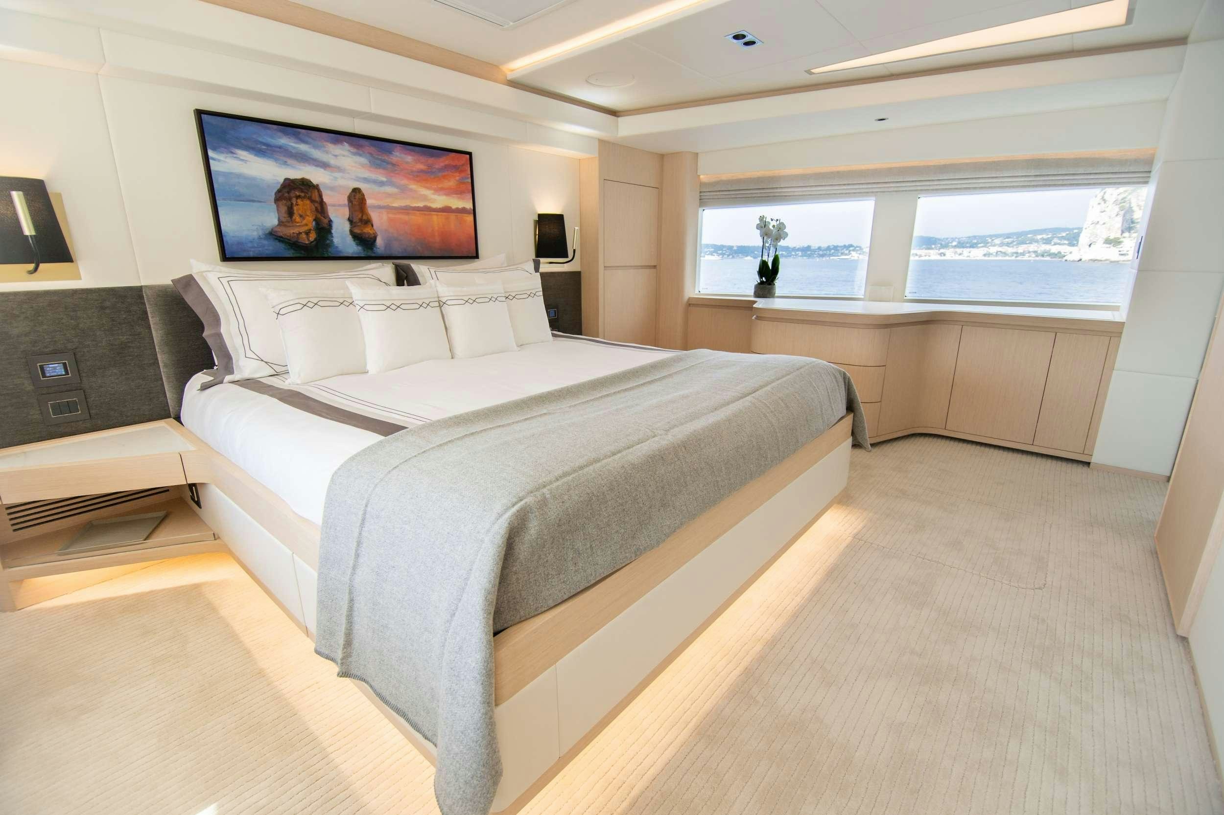 a large bed in a room aboard OCEAN VIEW Yacht for Charter