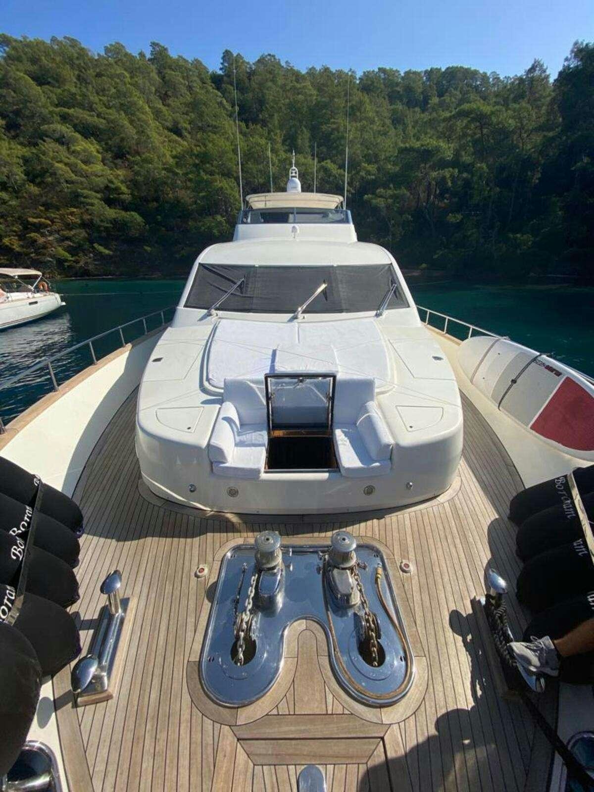 a boat on a dock aboard BORAM Yacht for Charter