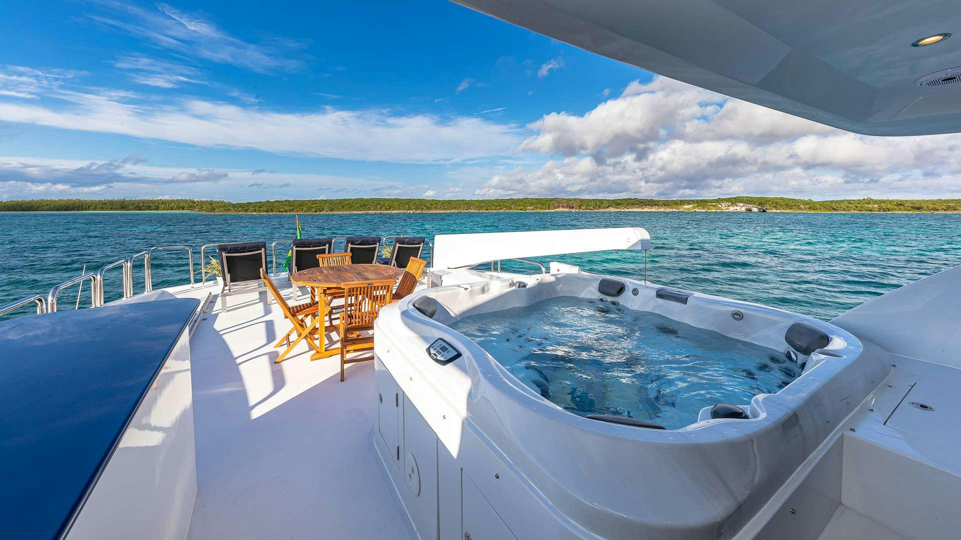 a boat on the water aboard B HAPPY Yacht for Charter