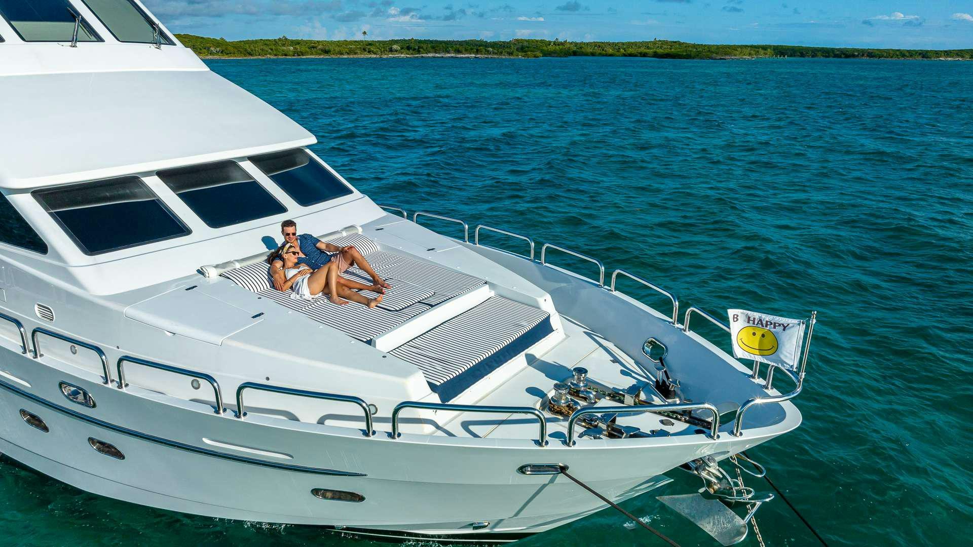 two men on a boat aboard B HAPPY Yacht for Charter