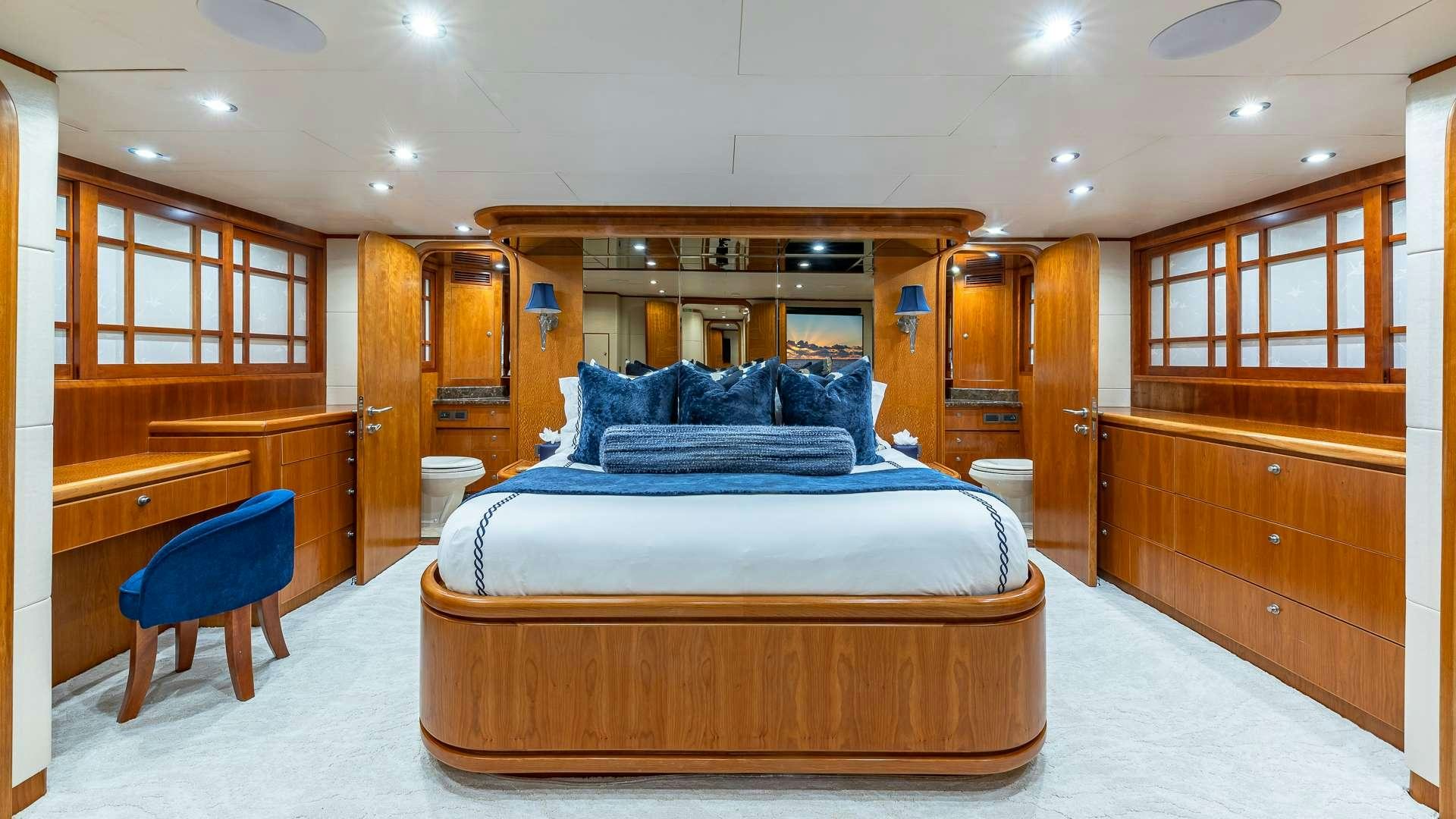 a bed in a room aboard B HAPPY Yacht for Charter