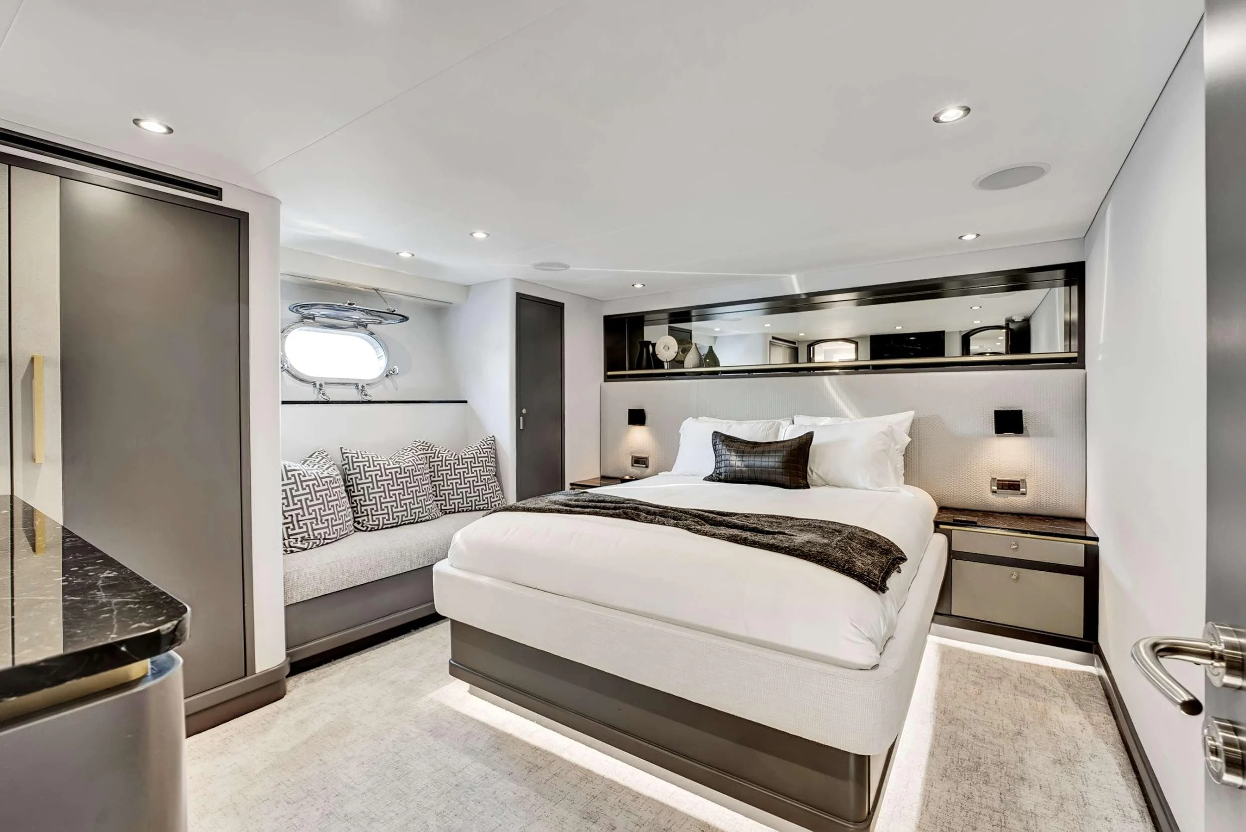 a bedroom with two beds aboard MAS GRANDE Yacht for Charter