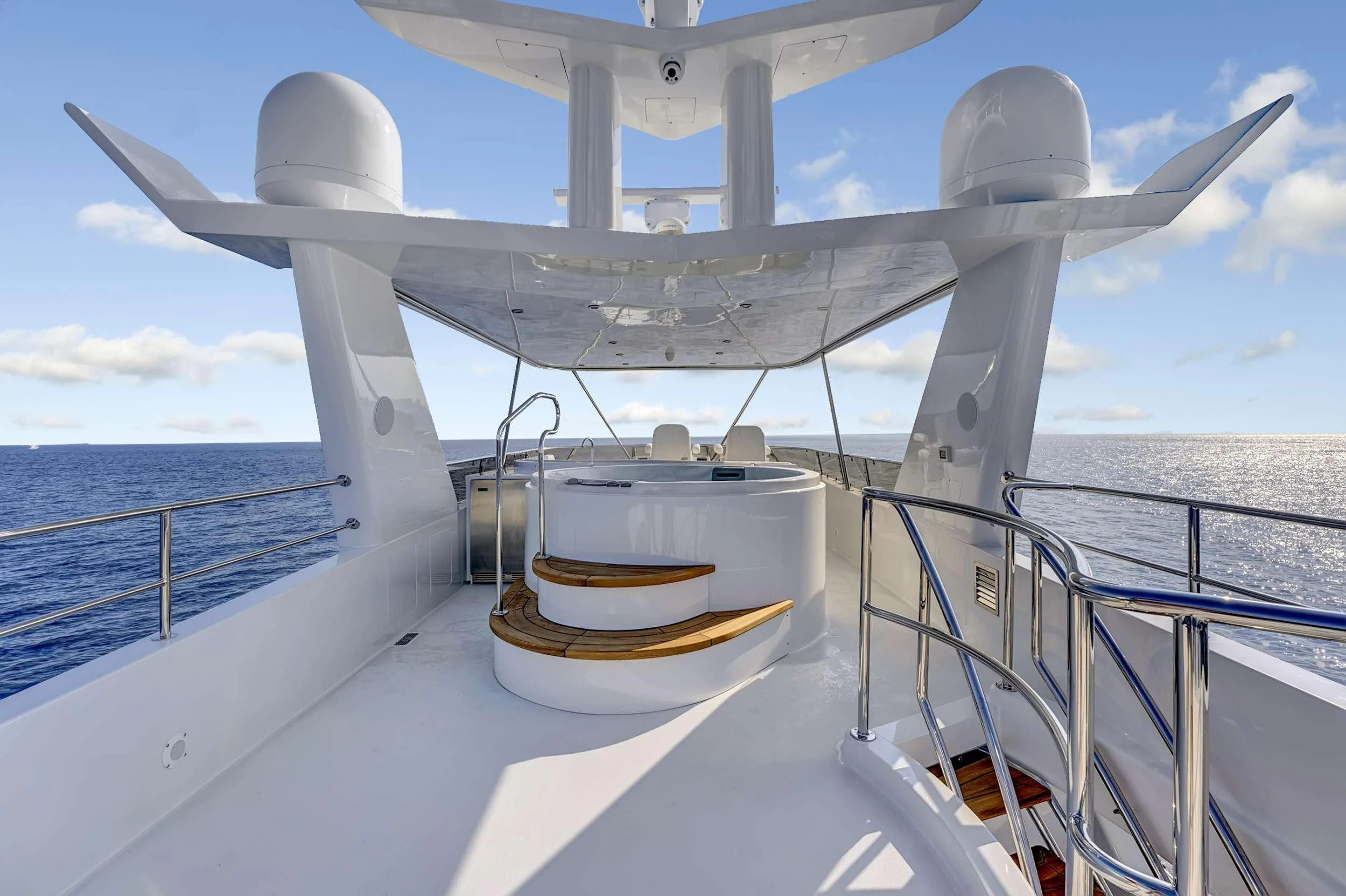 a large white ship on a body of water aboard MAS GRANDE Yacht for Charter