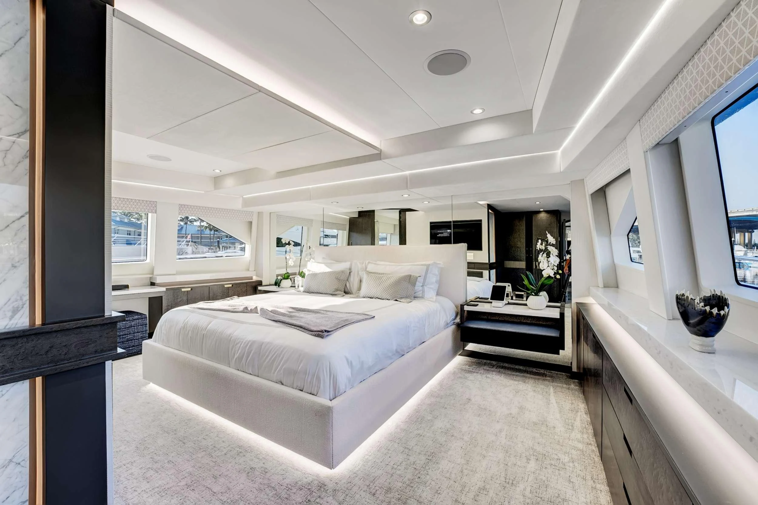a large bedroom with a large bed aboard MAS GRANDE Yacht for Charter