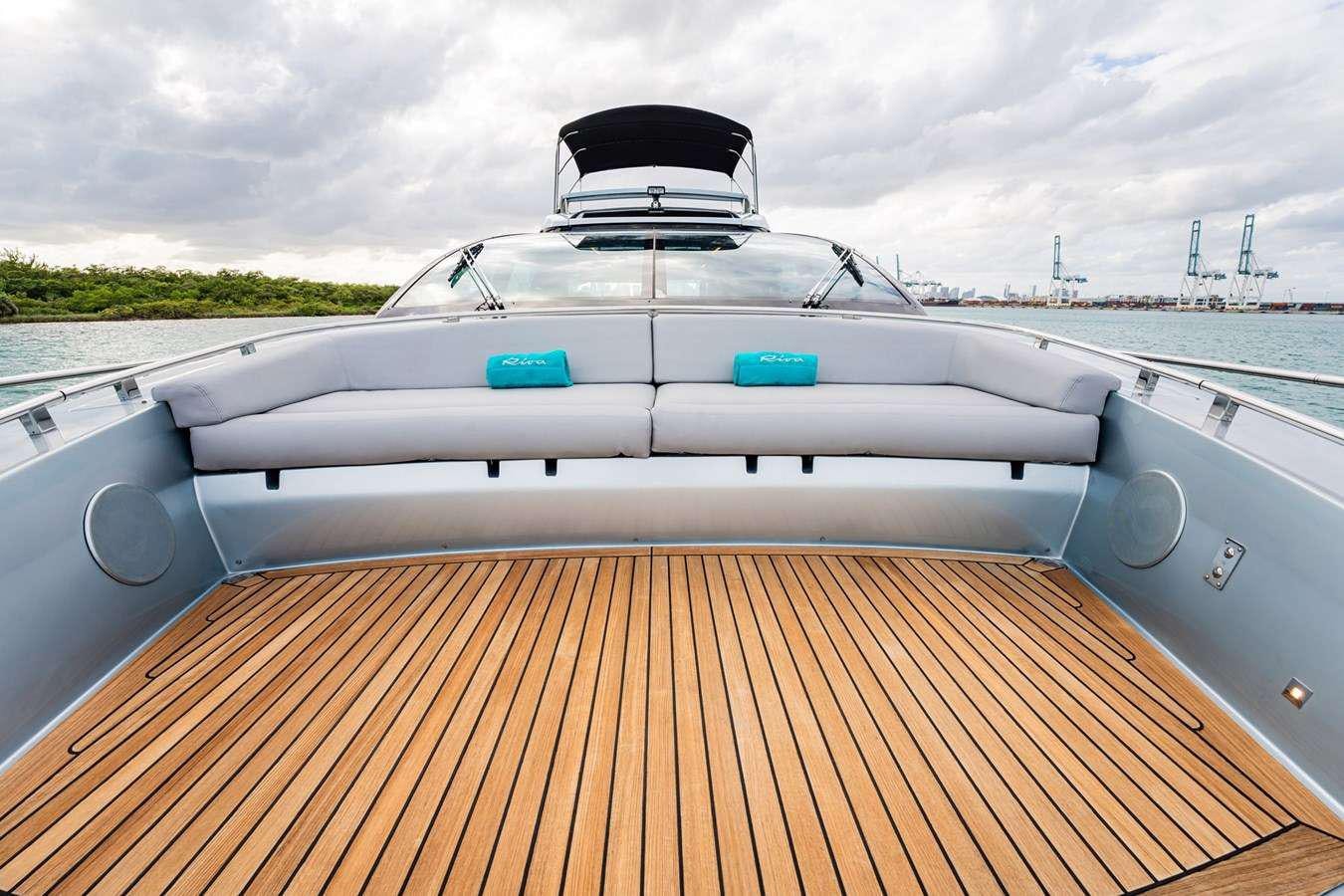 a boat on a deck aboard RECREATIONAL USE Yacht for Charter