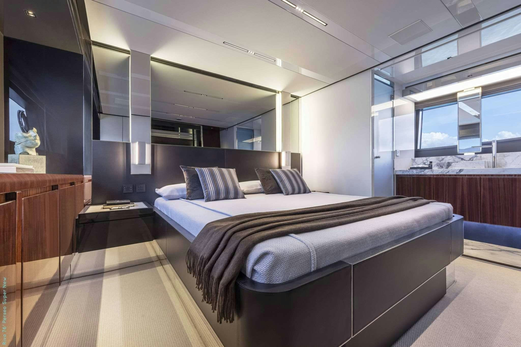 a bedroom with a bed aboard RECREATIONAL USE Yacht for Charter