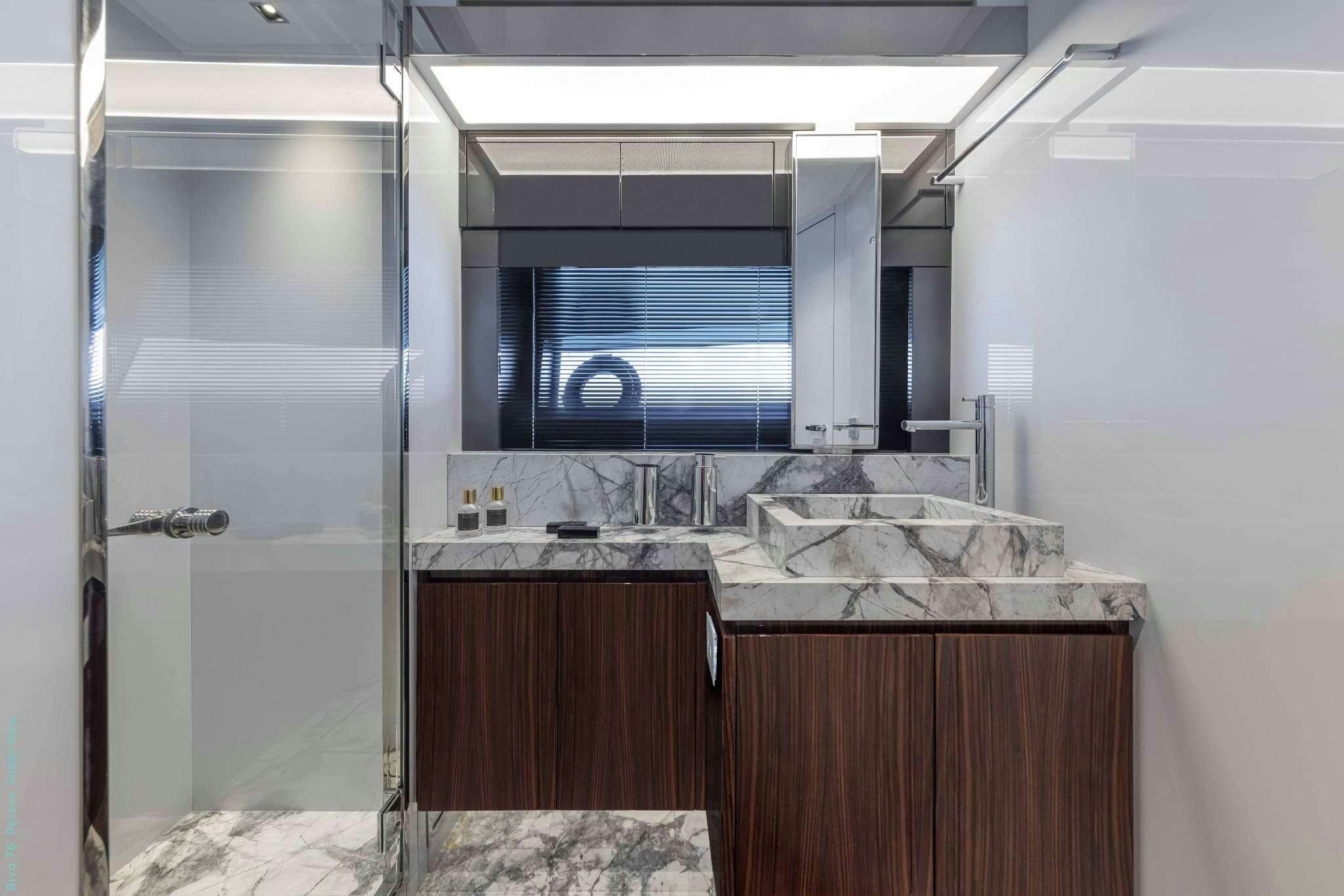 a kitchen with a glass door aboard RECREATIONAL USE Yacht for Charter