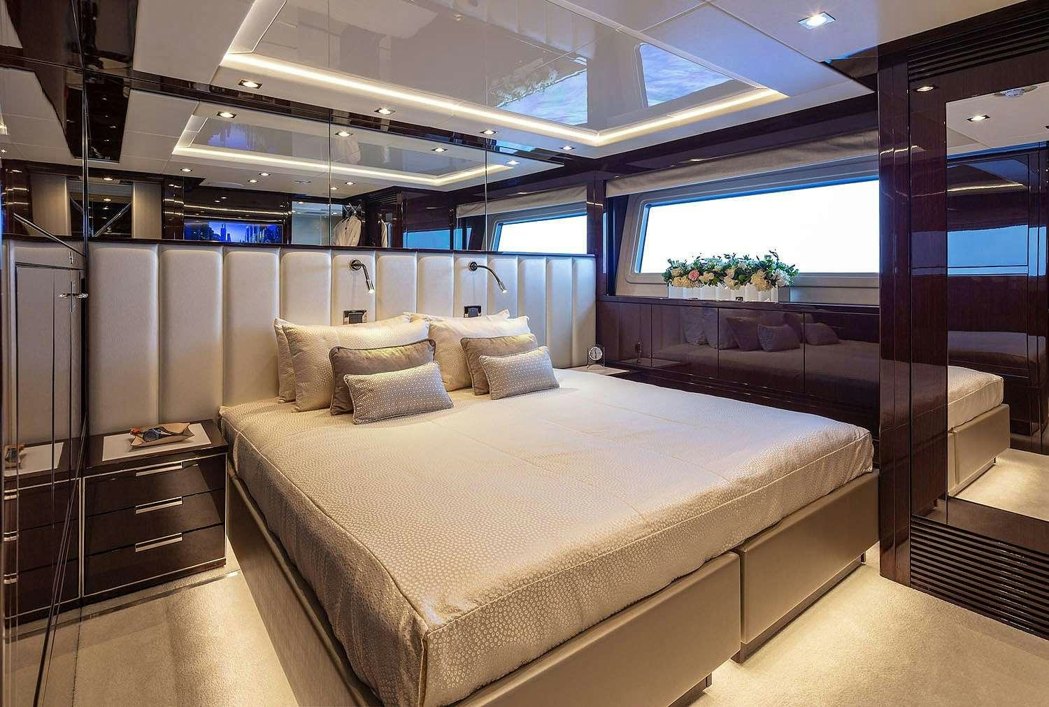a bed in a room aboard AQUA LIBRA Yacht for Charter