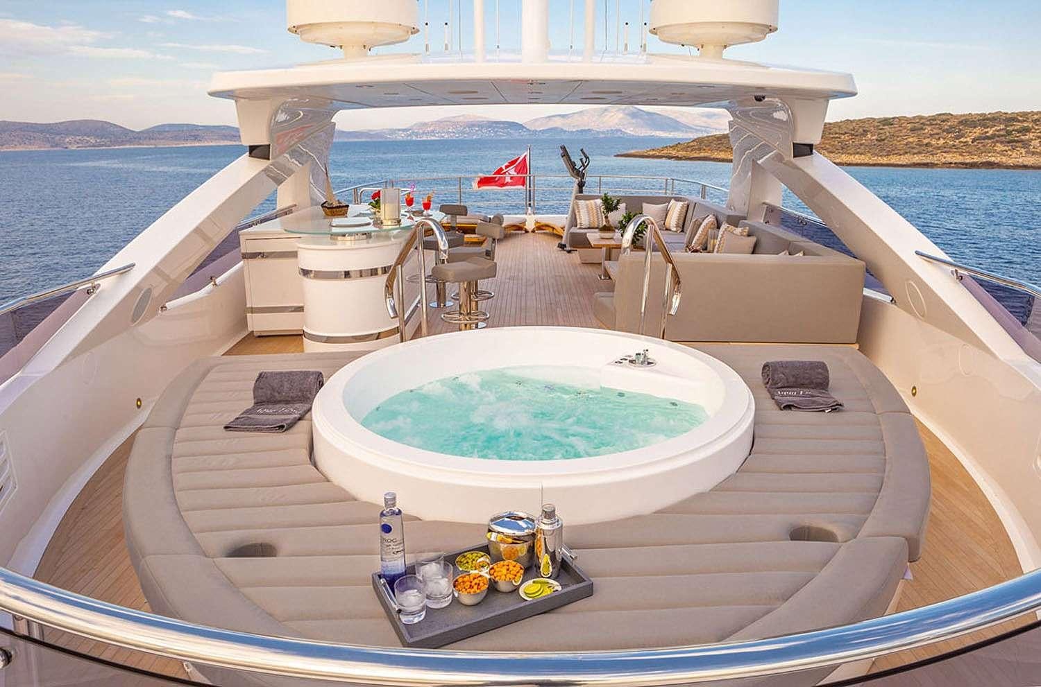 a pool on a deck aboard AQUA LIBRA Yacht for Charter