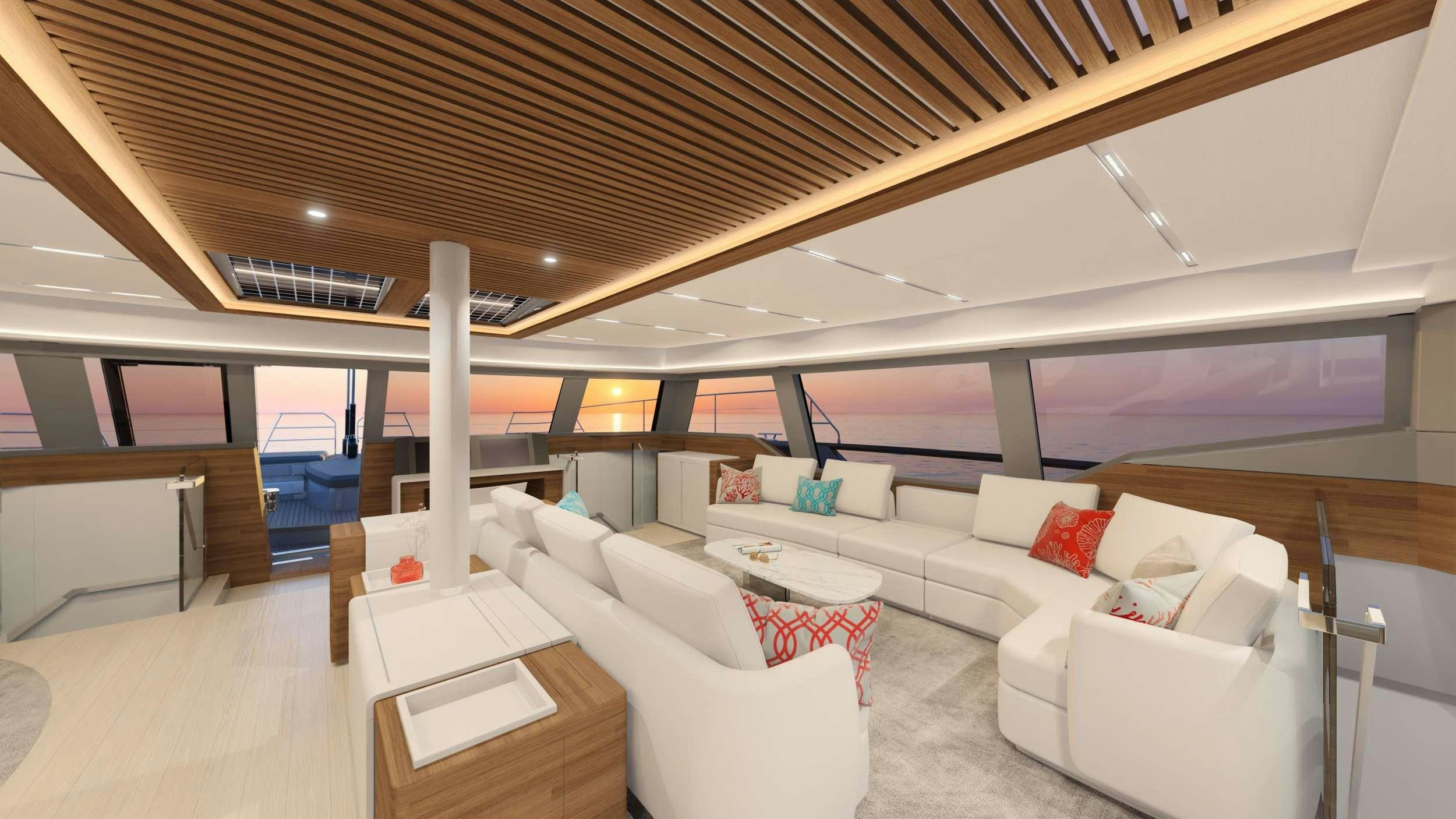 a room with a couch and a table aboard AD ASTRA 80 Yacht for Charter