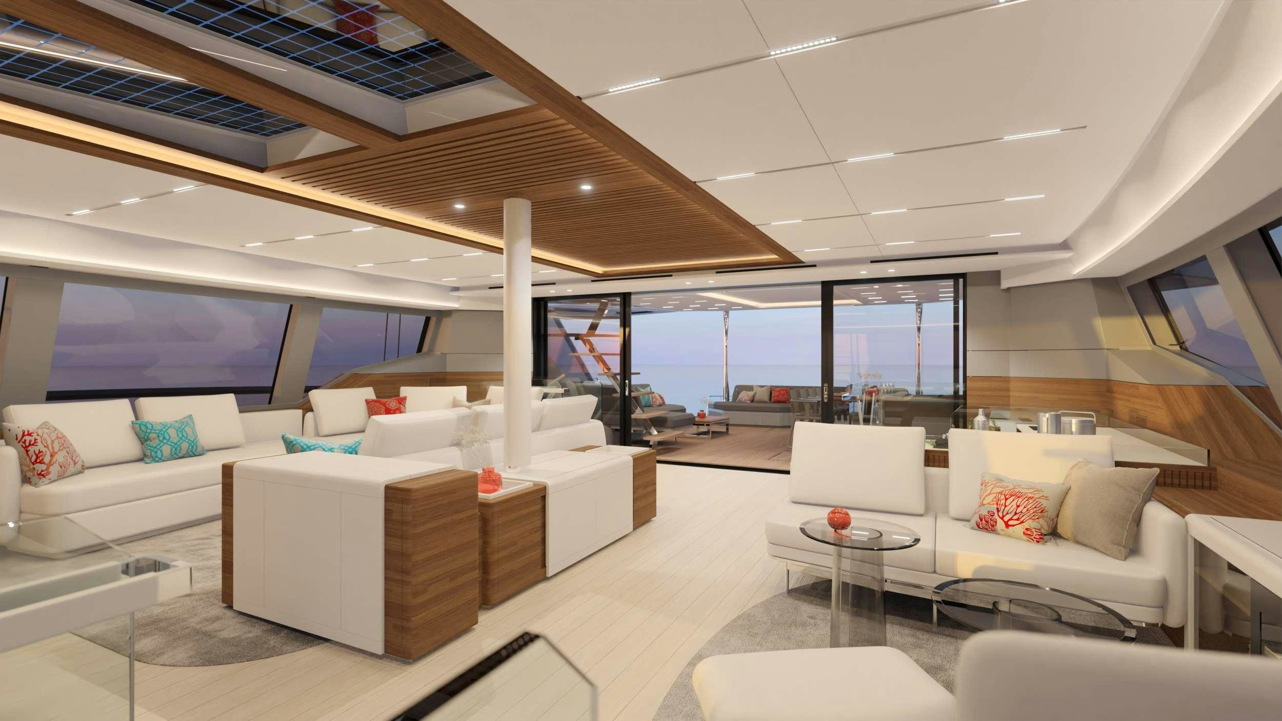 a room with a couch and a table aboard AD ASTRA 80 Yacht for Charter