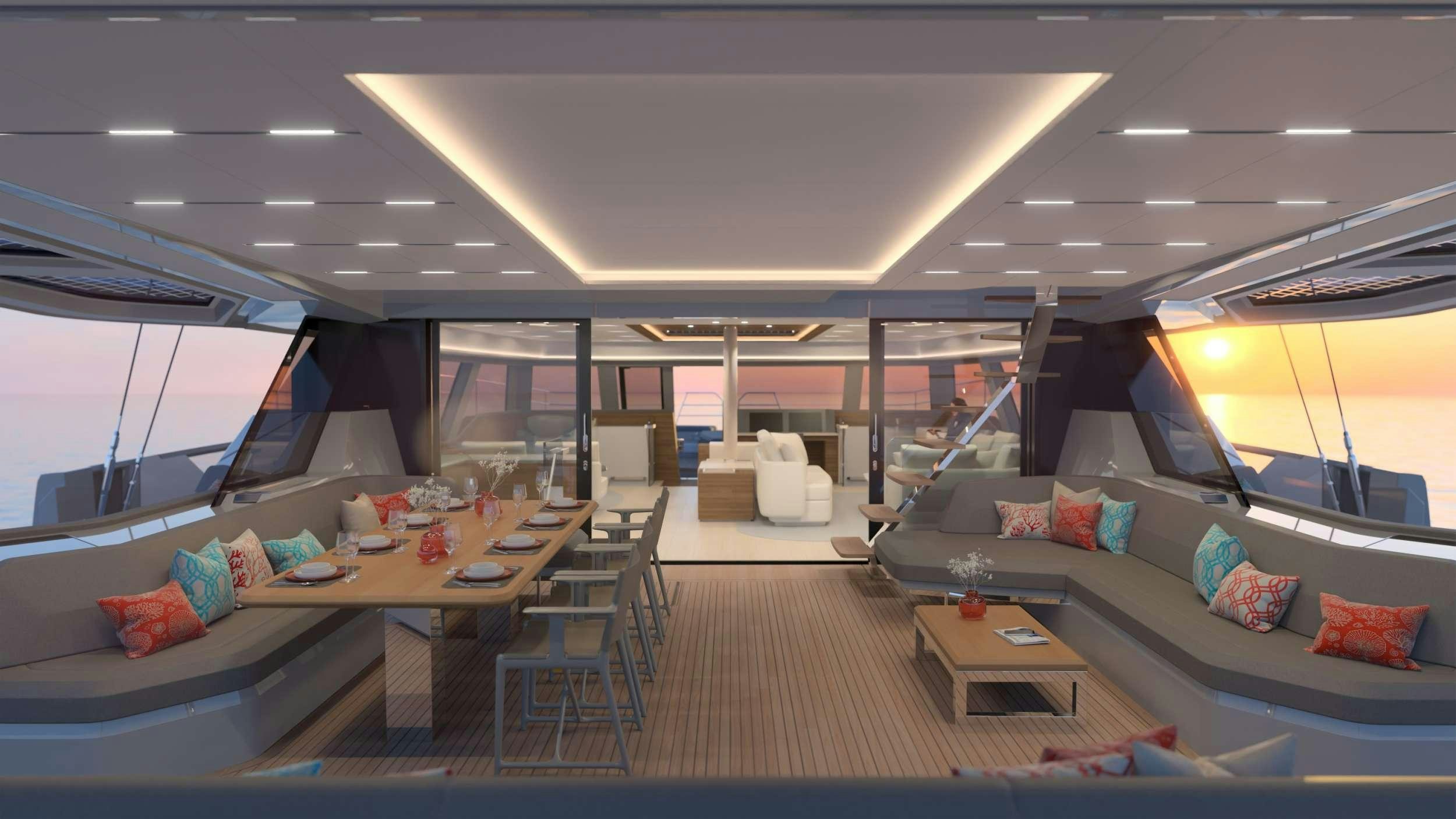 a room with a couch and a table aboard AD ASTRA 80 Yacht for Charter