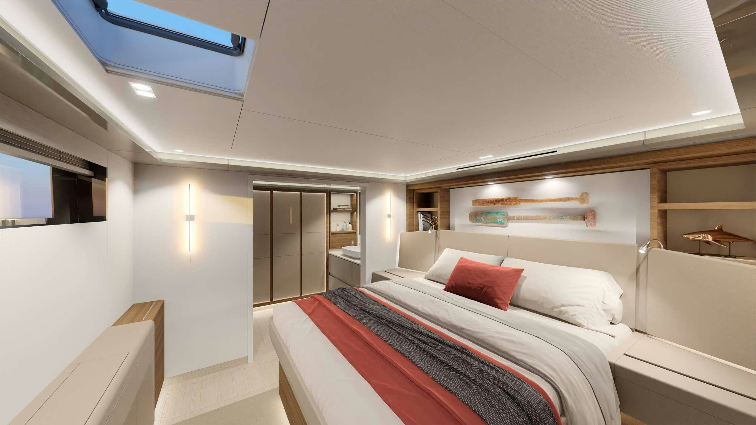 a room with a bed and a desk aboard AD ASTRA 80 Yacht for Charter