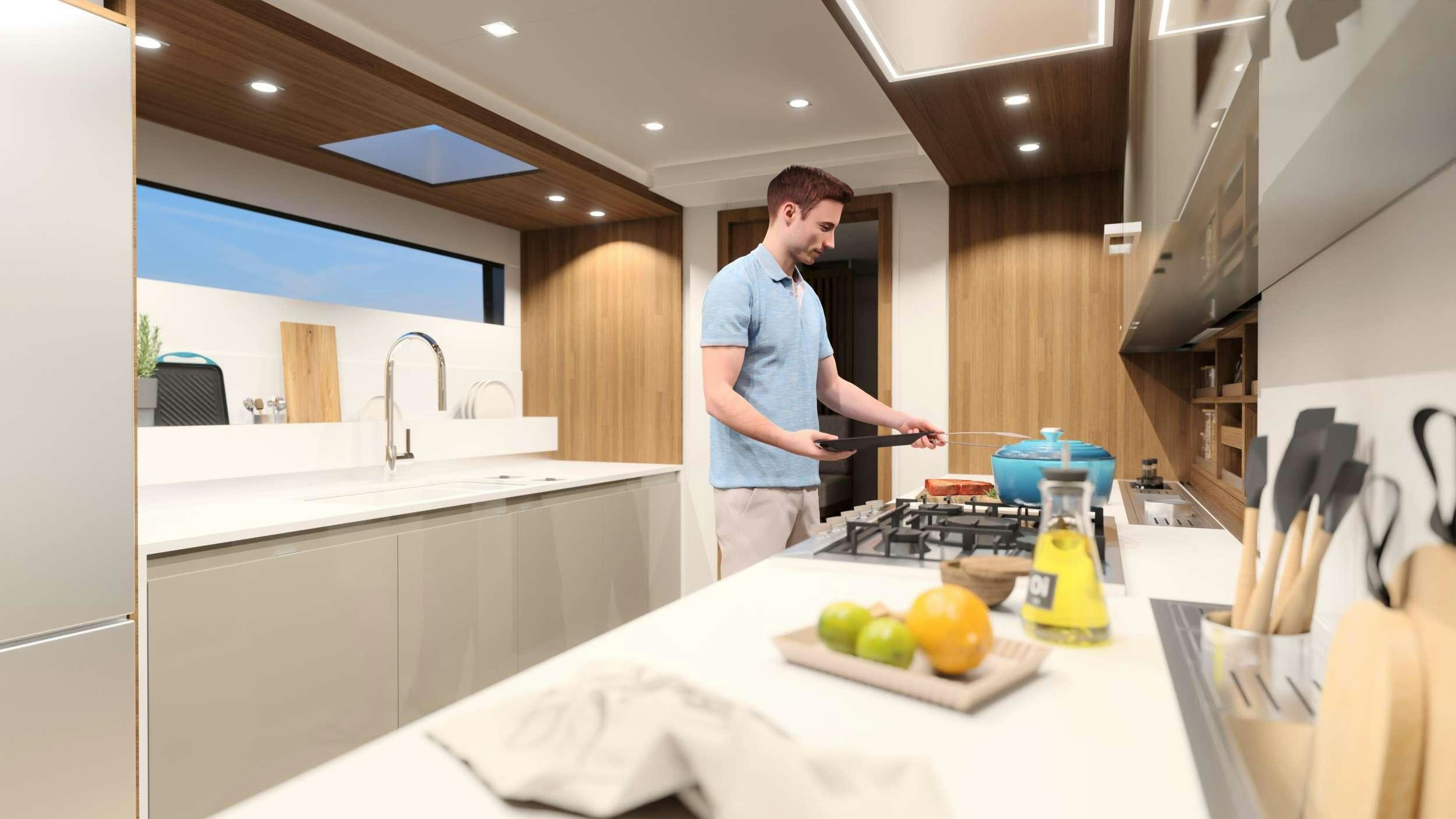 a person in a kitchen aboard AD ASTRA 80 Yacht for Charter
