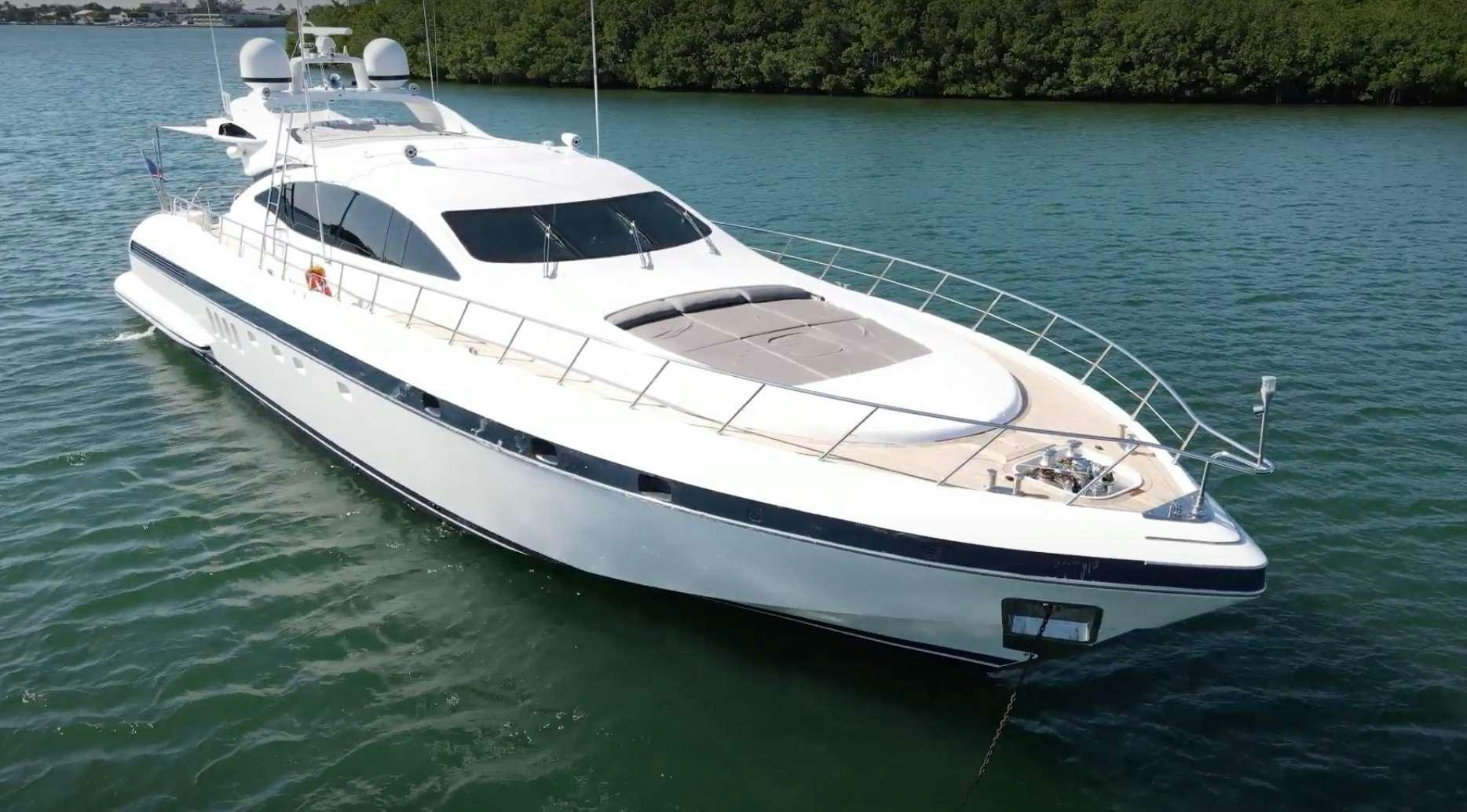 a white yacht on the water aboard SMILE Yacht for Charter