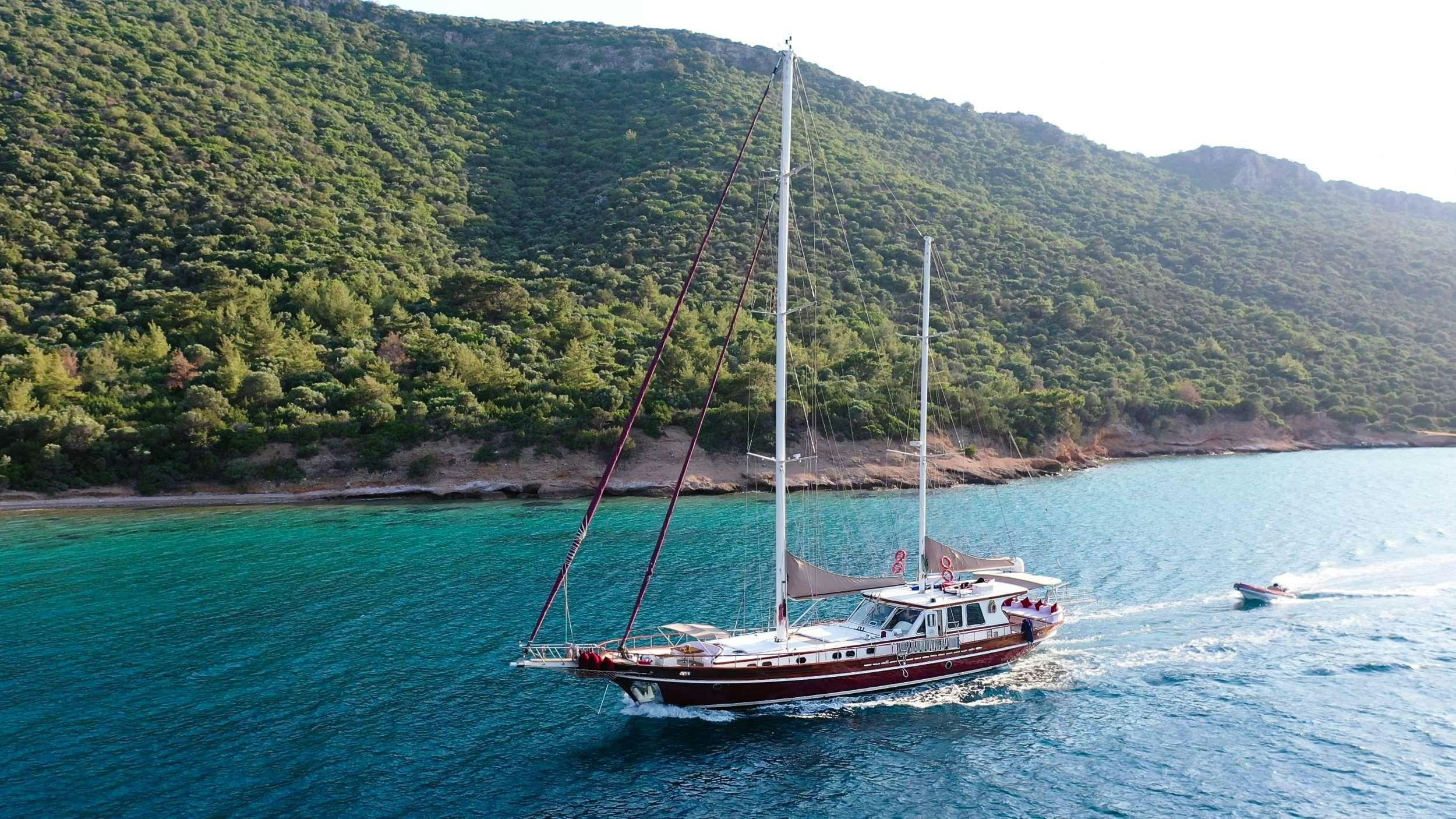 a sailboat on the water aboard SIYU Yacht for Charter
