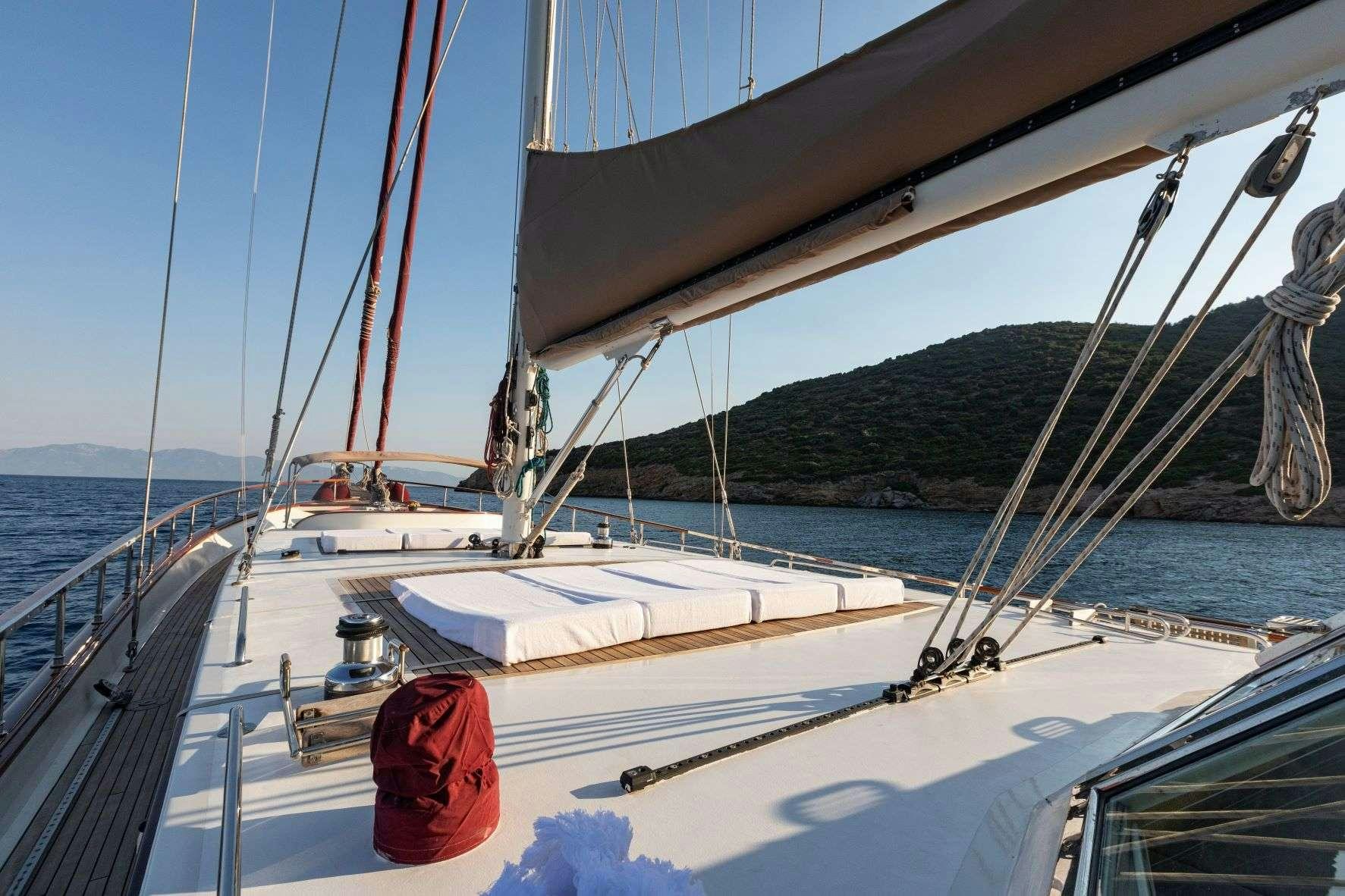 a sailboat on the water aboard SIYU Yacht for Charter
