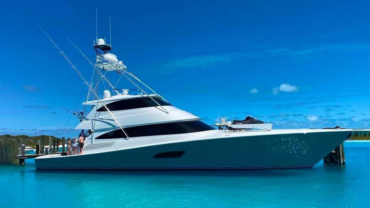 a white yacht in the water aboard TOUCHE Yacht for Charter
