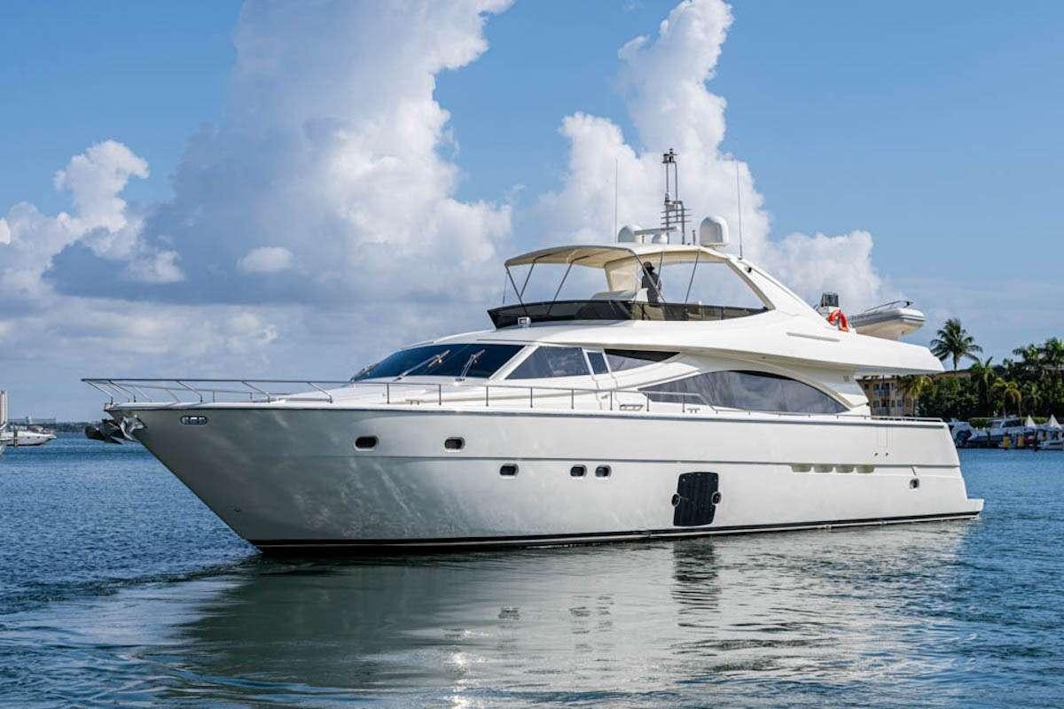 a white yacht on the water aboard LA PALOMA  Yacht for Charter