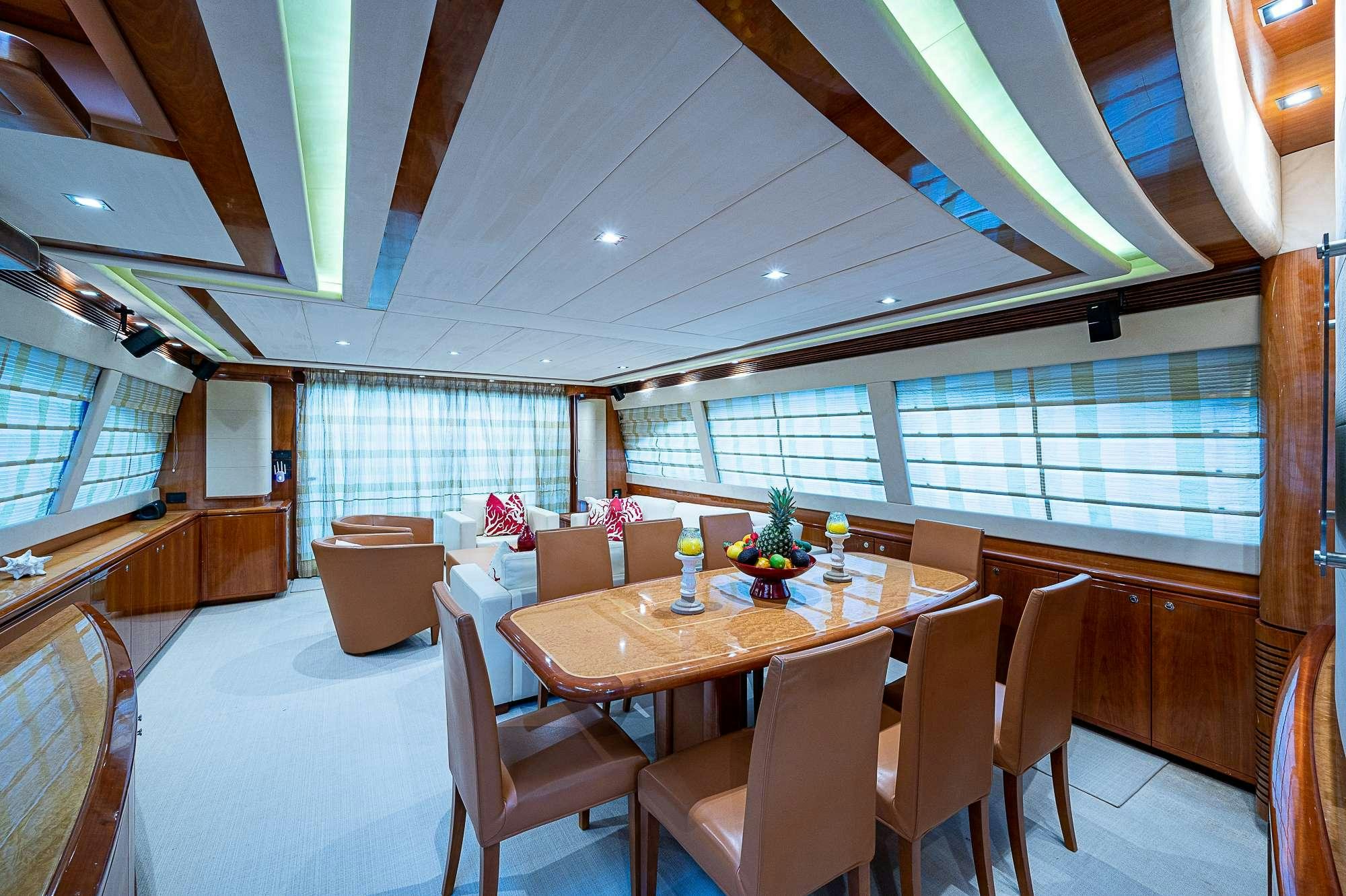 a dining table in a room aboard LA PALOMA  Yacht for Charter