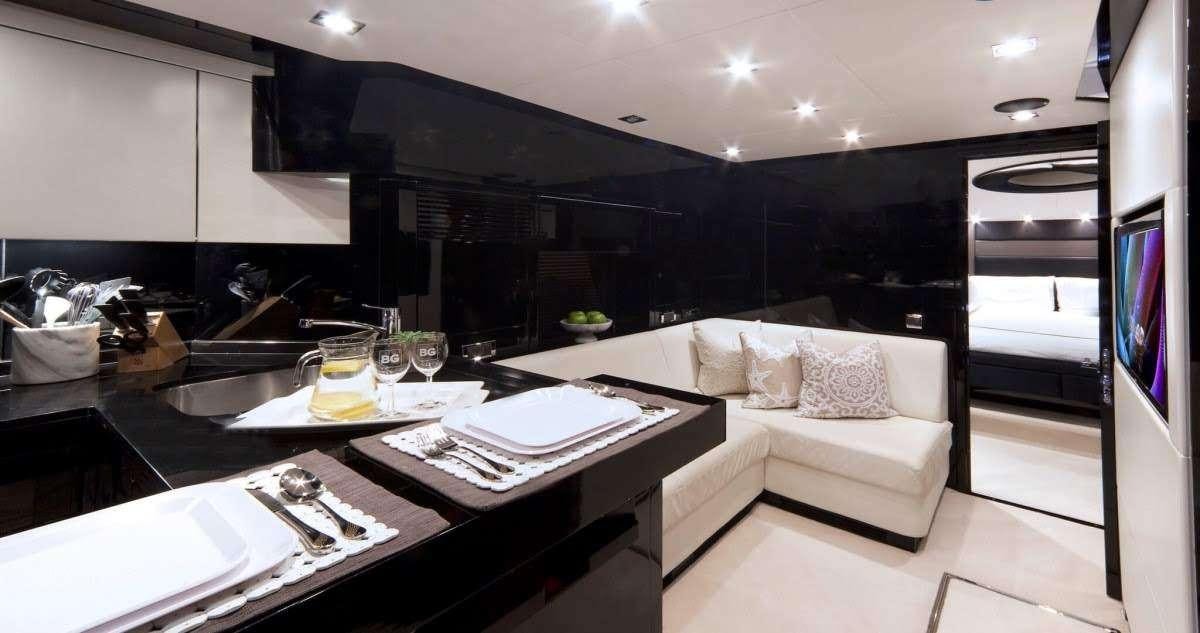 a modern looking living room aboard ALL IN Yacht for Charter