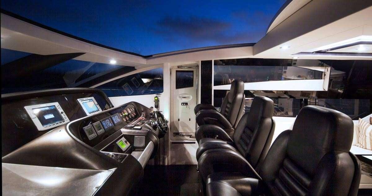inside of a car aboard ALL IN Yacht for Charter