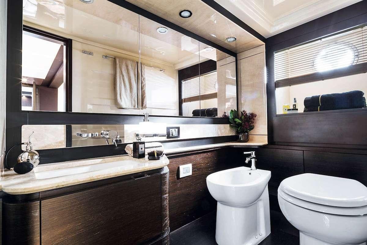 a bathroom with a large mirror aboard CERULEAN Yacht for Charter