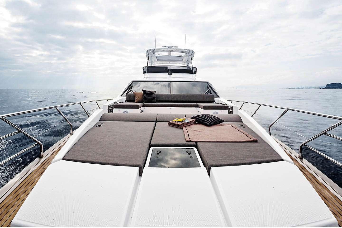 a boat on a body of water aboard MOZZ Yacht for Charter