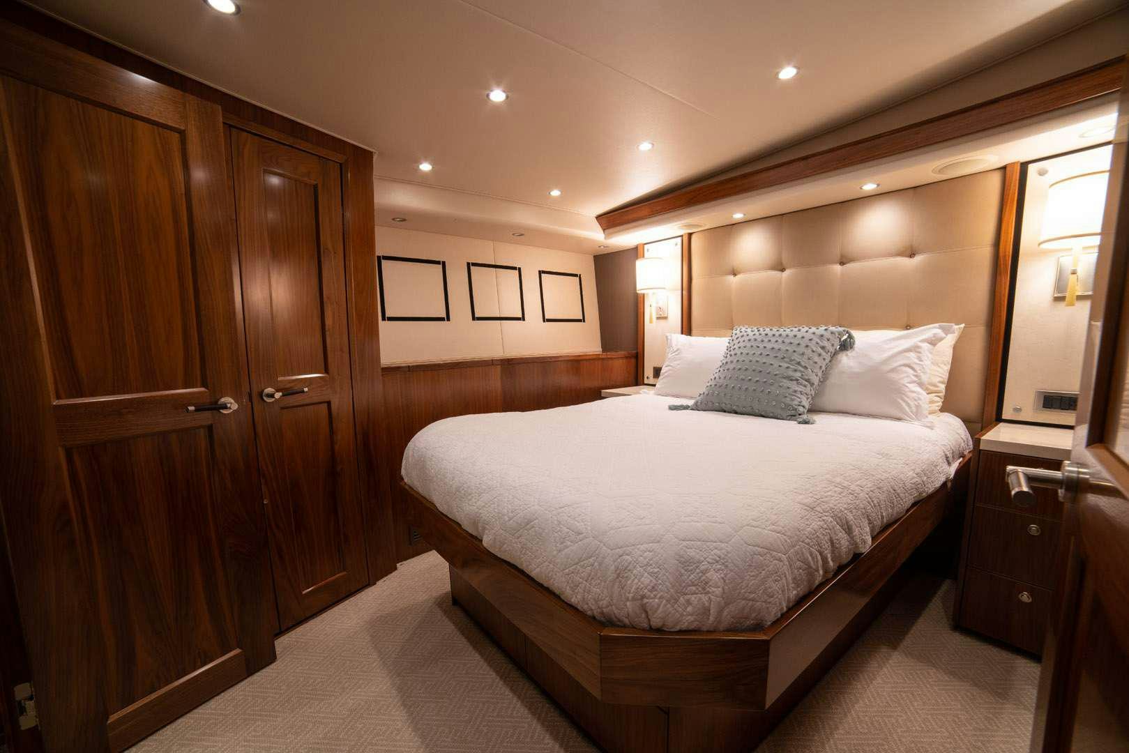 a bed in a hotel room aboard FA-LA-ME Yacht for Charter
