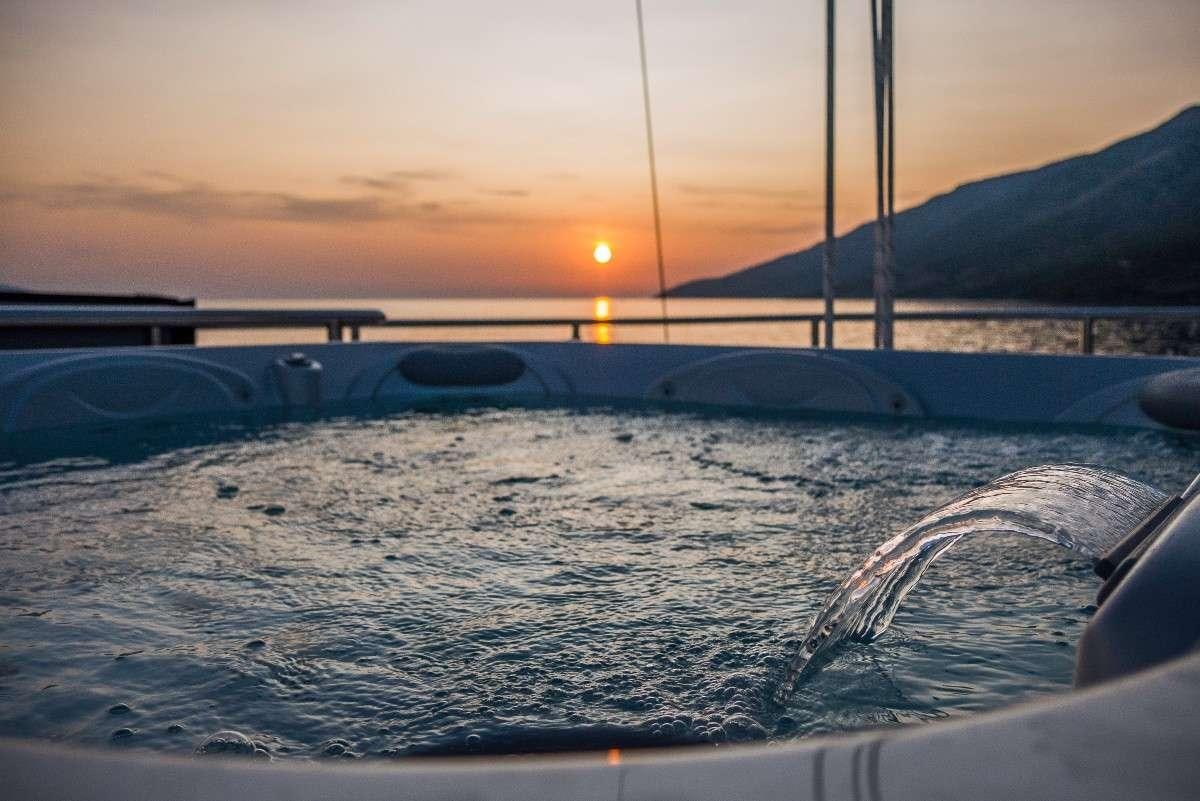 a boat in the water aboard OMNIA Yacht for Charter