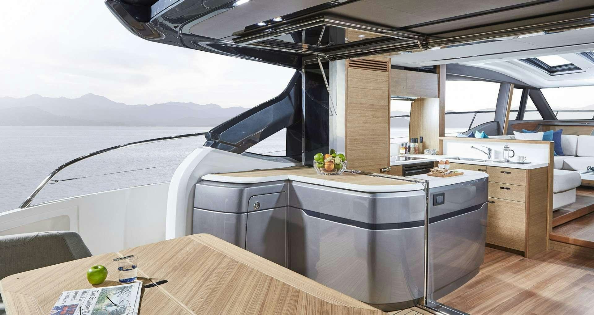 a room with a table and chairs aboard MESOFA Yacht for Charter