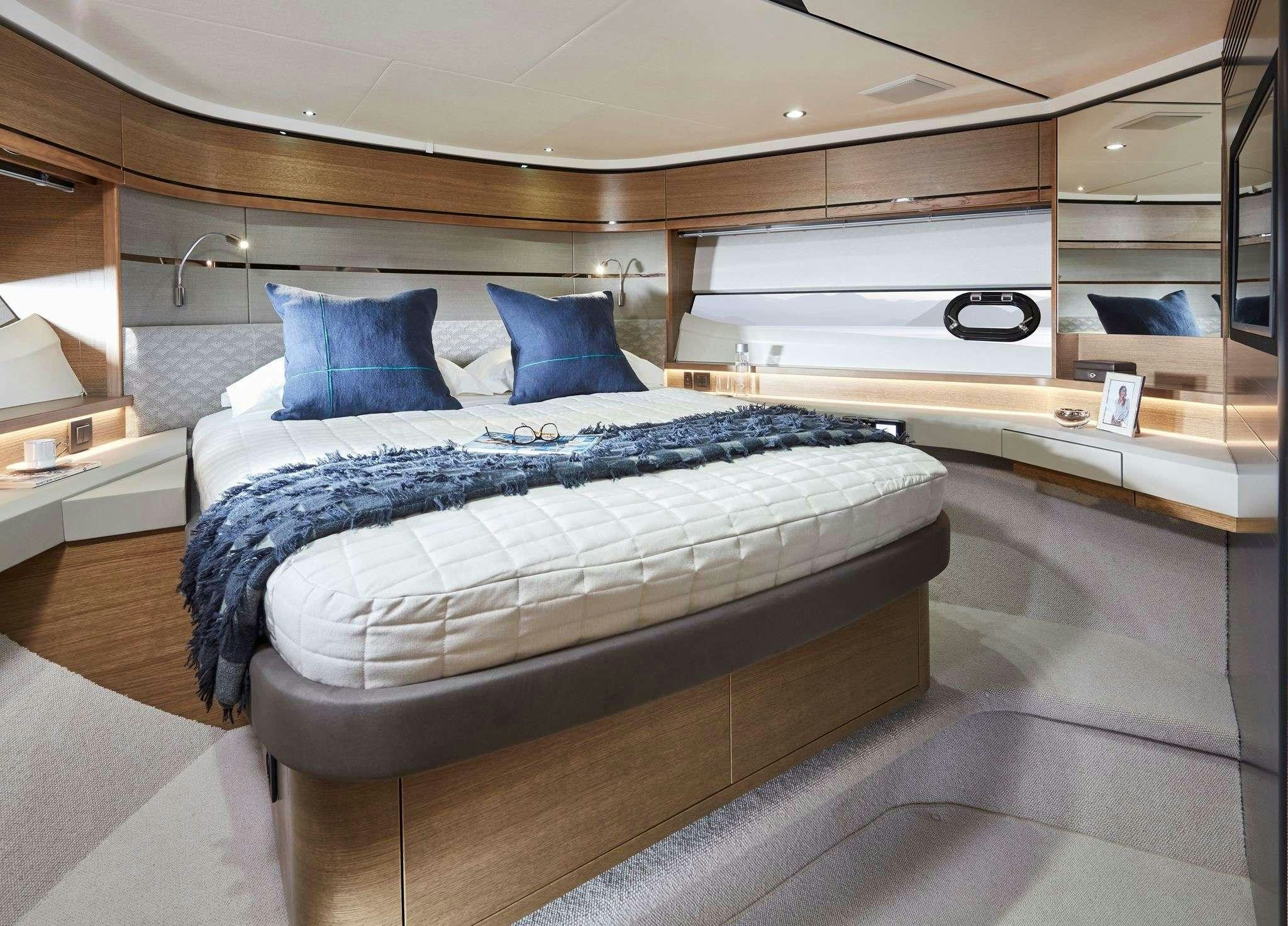 a bed in a room aboard MESOFA Yacht for Charter