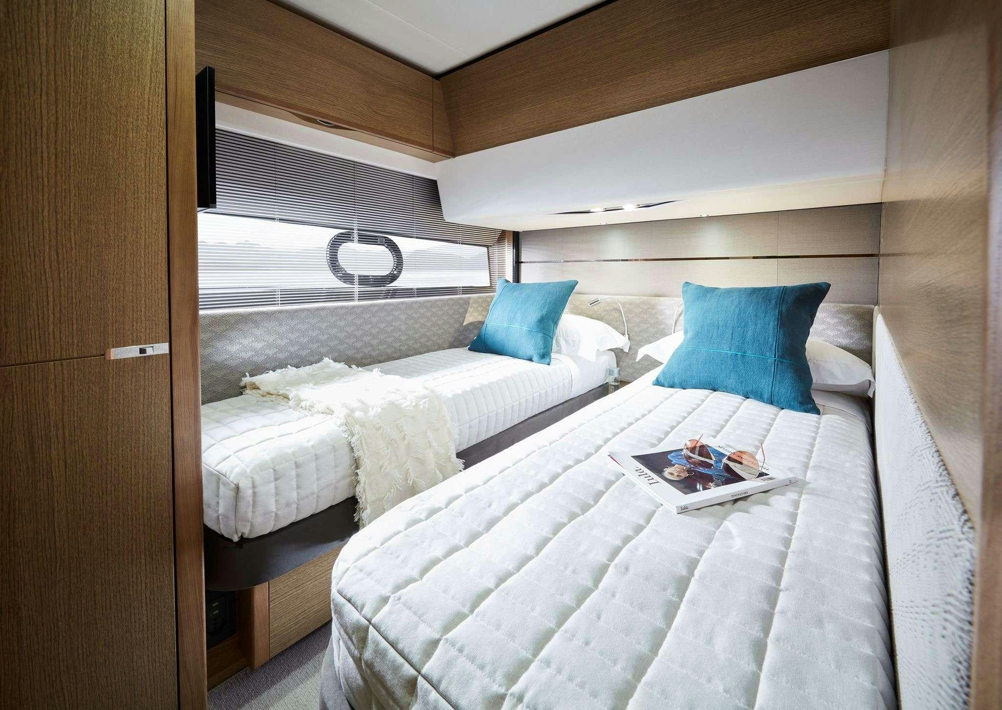 a room with two beds aboard MESOFA Yacht for Charter