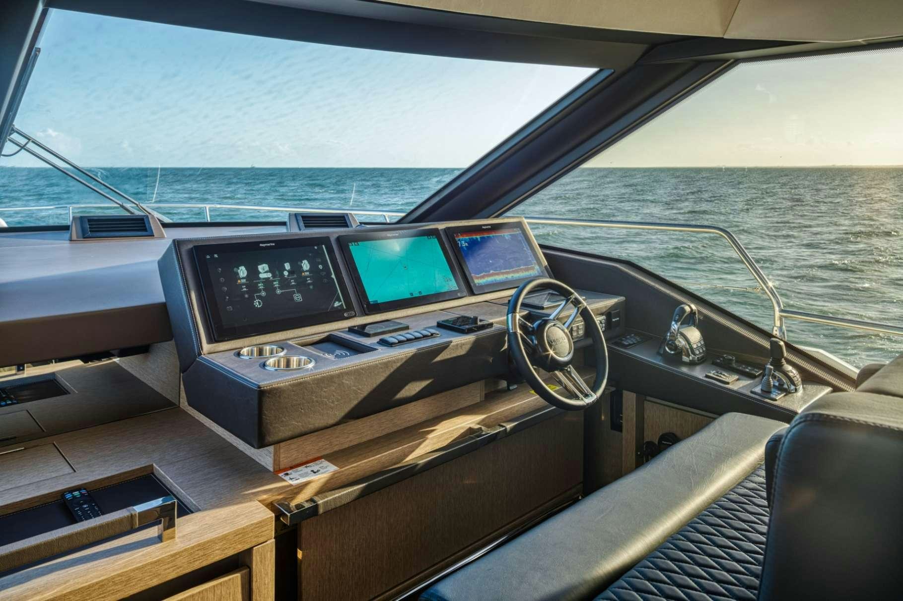 a boat with a couple of monitors aboard BAZINGA Yacht for Charter